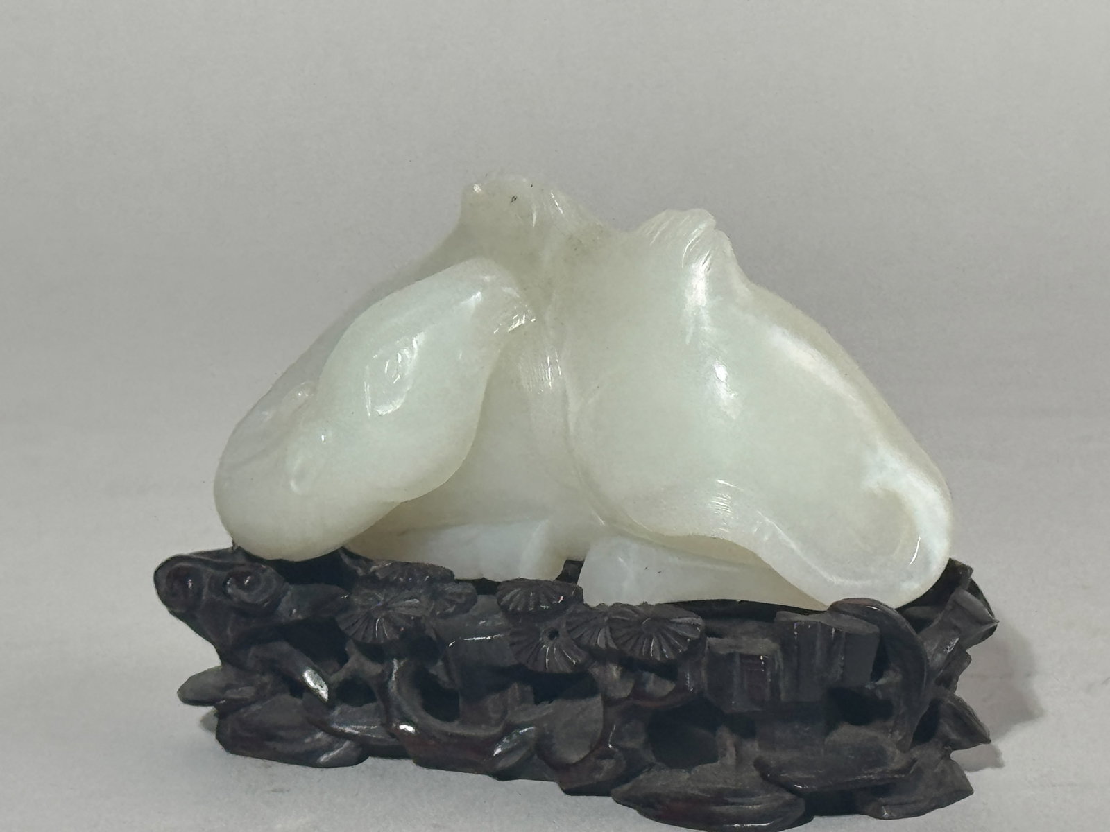 A CHINESE WHITE JADE CAMEL ON FANCY HARDWOOD STAND - 5
