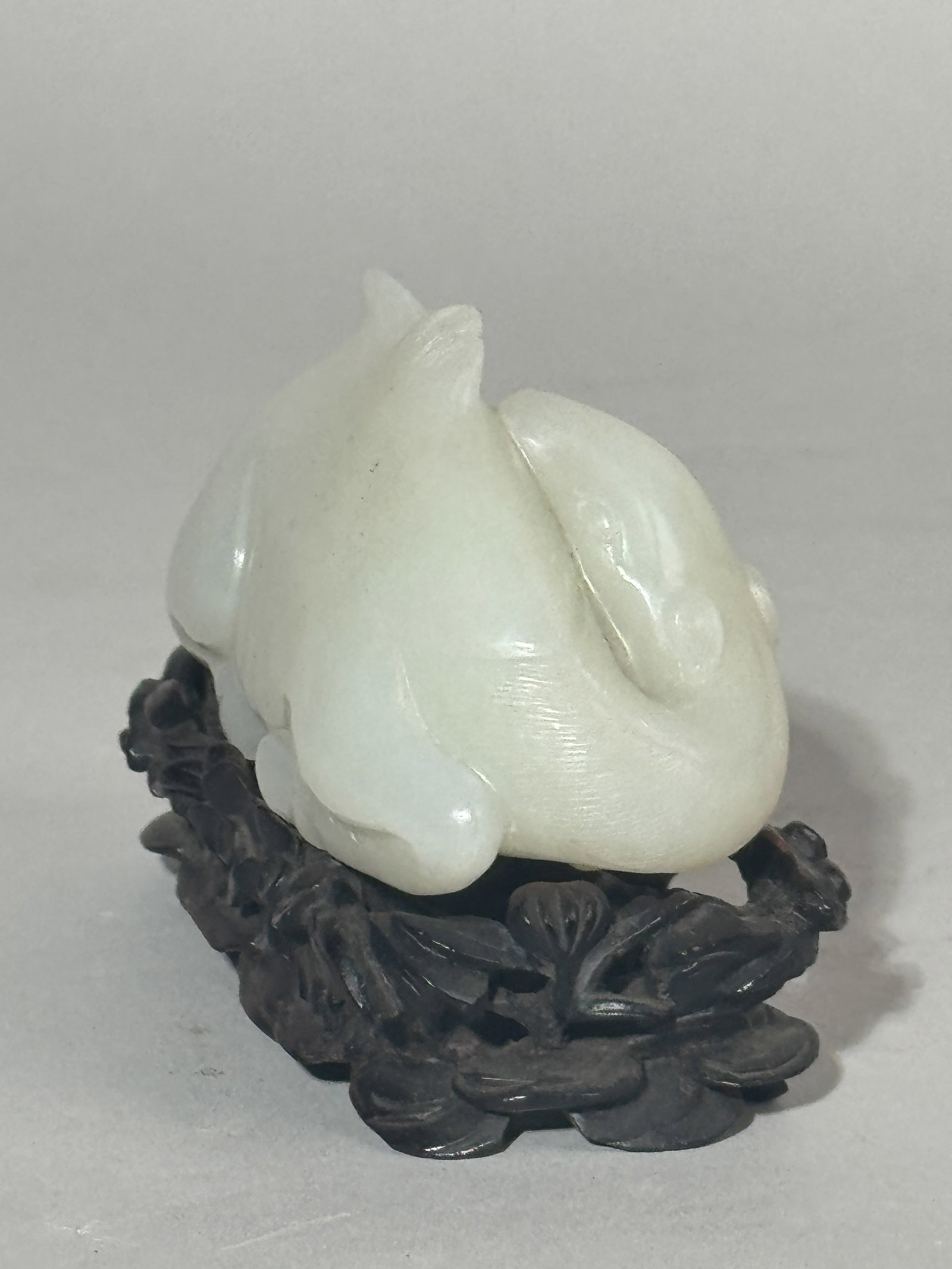 A CHINESE WHITE JADE CAMEL ON FANCY HARDWOOD STAND - 8