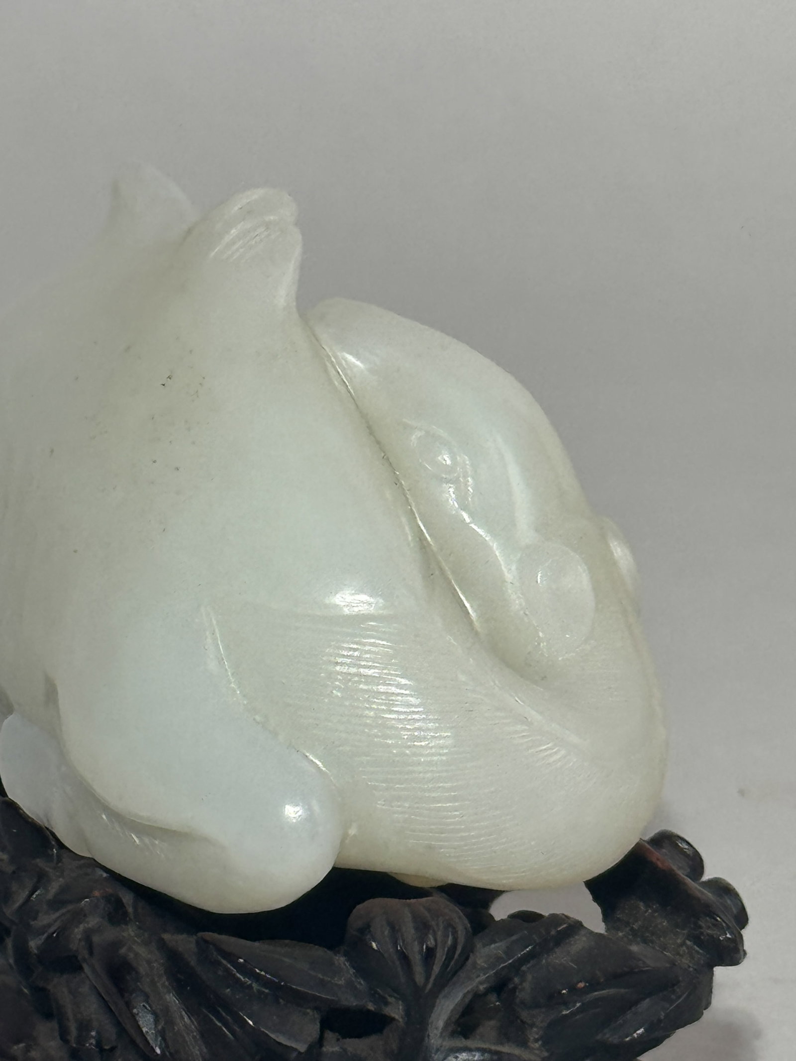 A CHINESE WHITE JADE CAMEL ON FANCY HARDWOOD STAND - 9