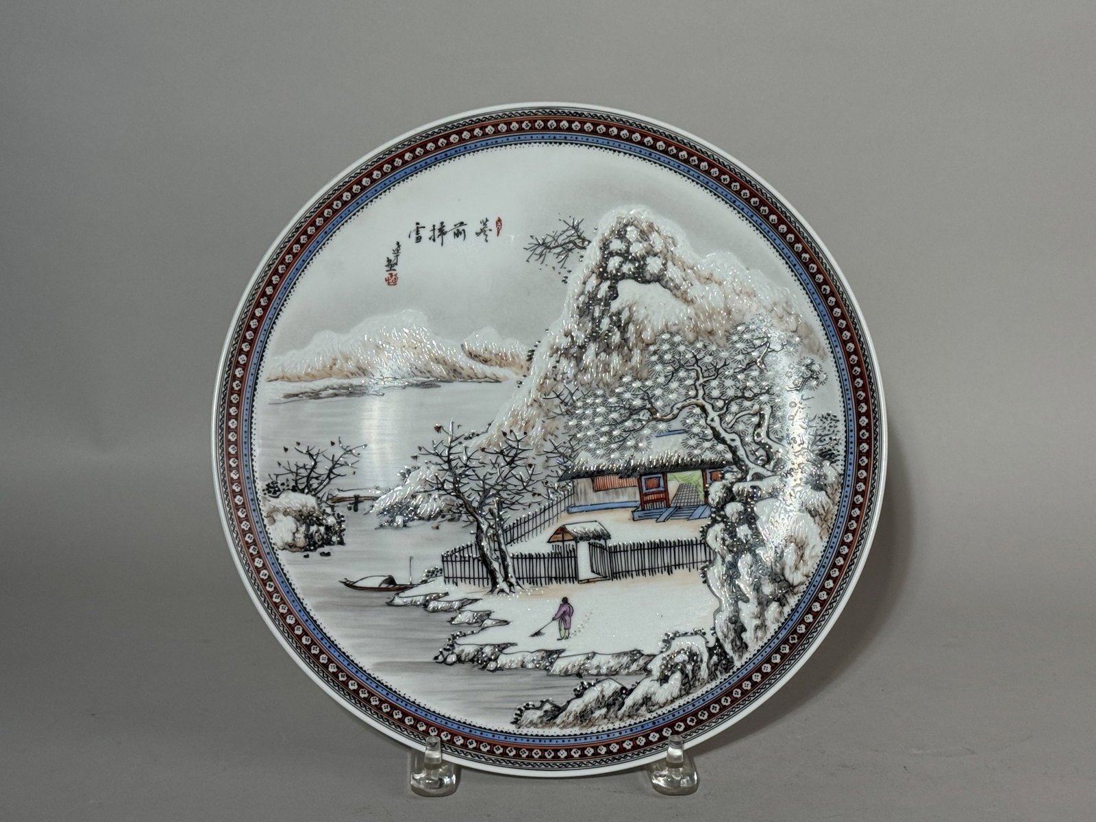 A CHINESE SNOW SCENE PORCELAIN CHARGER: A Chinese snow scene porcelain charger, artist signed. Dimensions: Diameter: 12 in. (30.5 cm). Note: This item is in New York, where it can be shipped from.