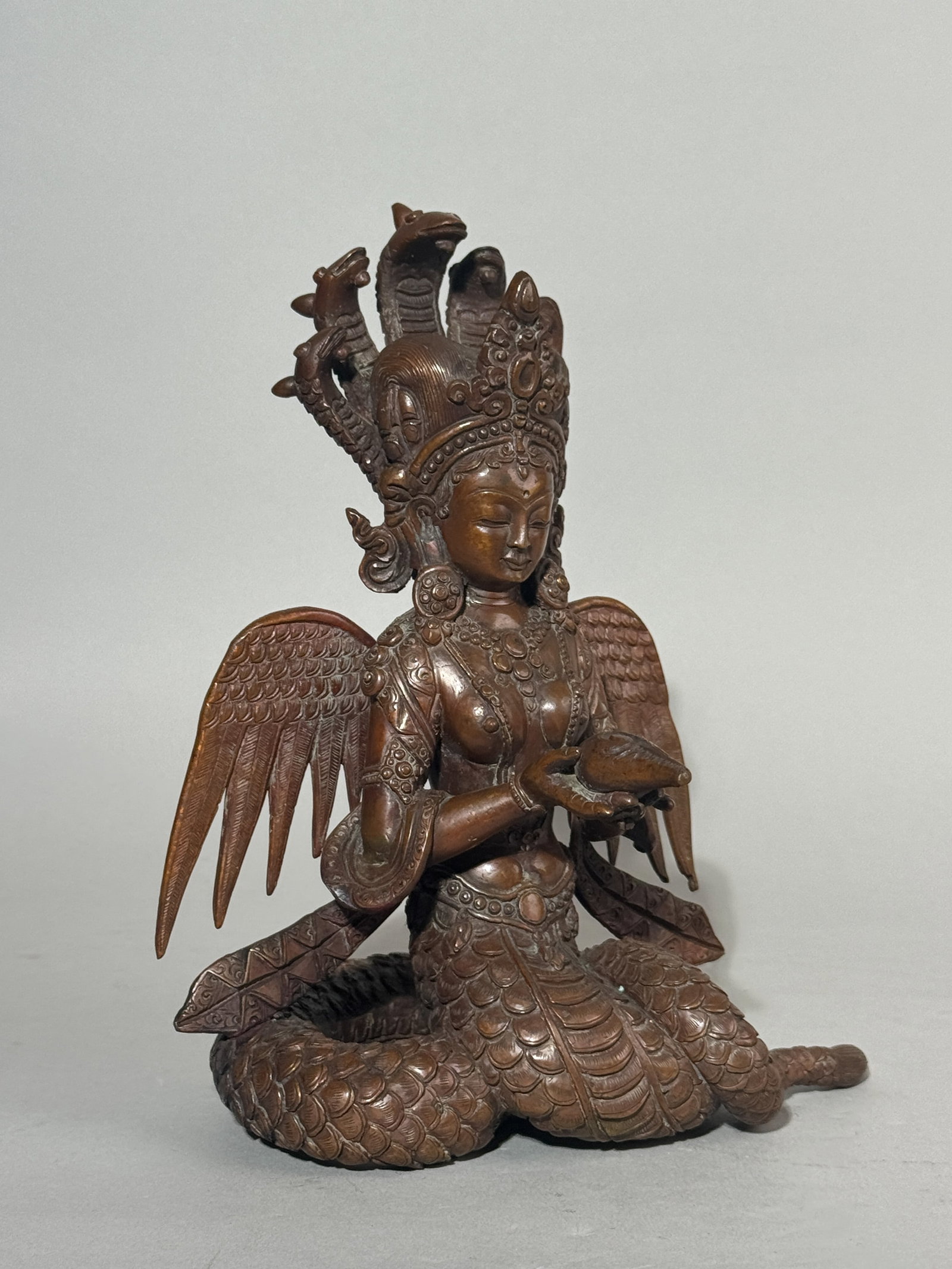 NEPALESE BRONZE STATUE OF NAGA: A Nepalese bronze Naga statue of fine detail. Dimensions: Height: 8.5 in. (21.6 cm). Note: This item is in New York, where it can be shipped from.