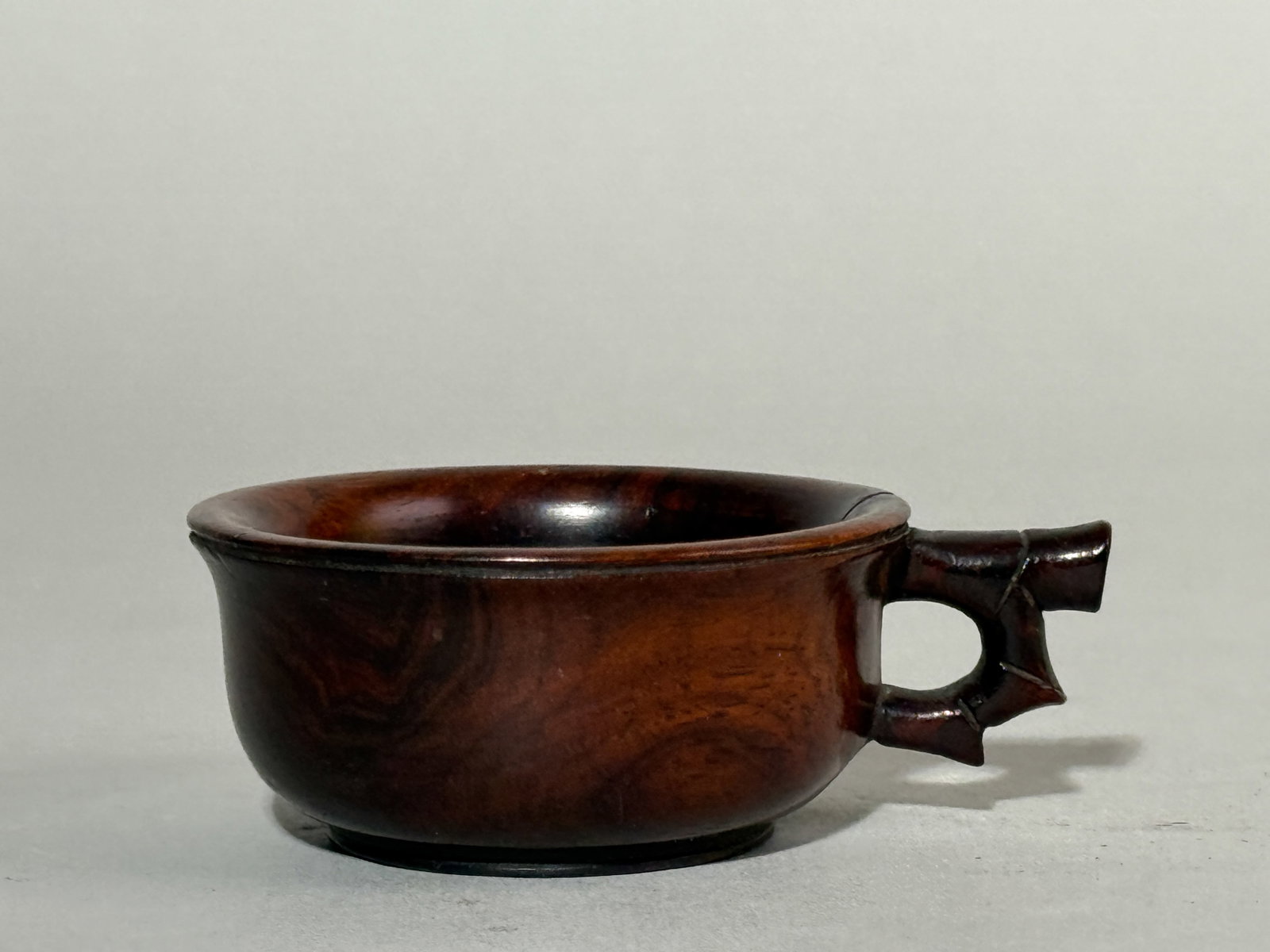 CHINESE HUANGHUALI SCHOLAR CUP: A Chinese Huanghuali scholar cup, 19th century. Dimensions: Width: 3 in. (7.6 cm). Note: This item is in New York, where it can be shipped from.