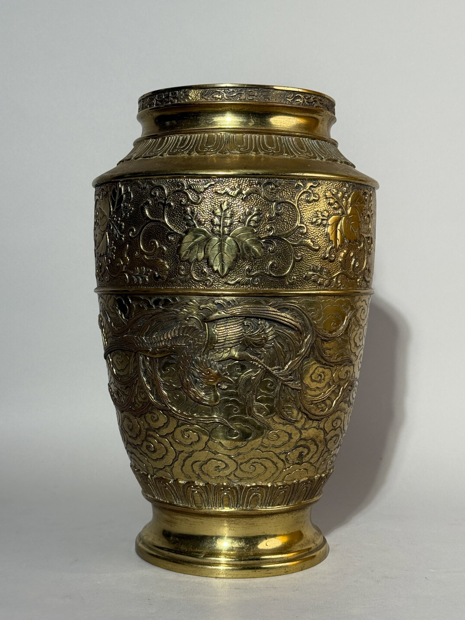 JAPANESE MEIJI BRONZE VASE WITH PHOENIX MOTIF: A Japanese Meiji bronze vase with a phoenix motif and family crest, signed. Dimensions: Height: 13.5 in. (34.3 cm). Note: This item is in New York, where it can be shipped from.