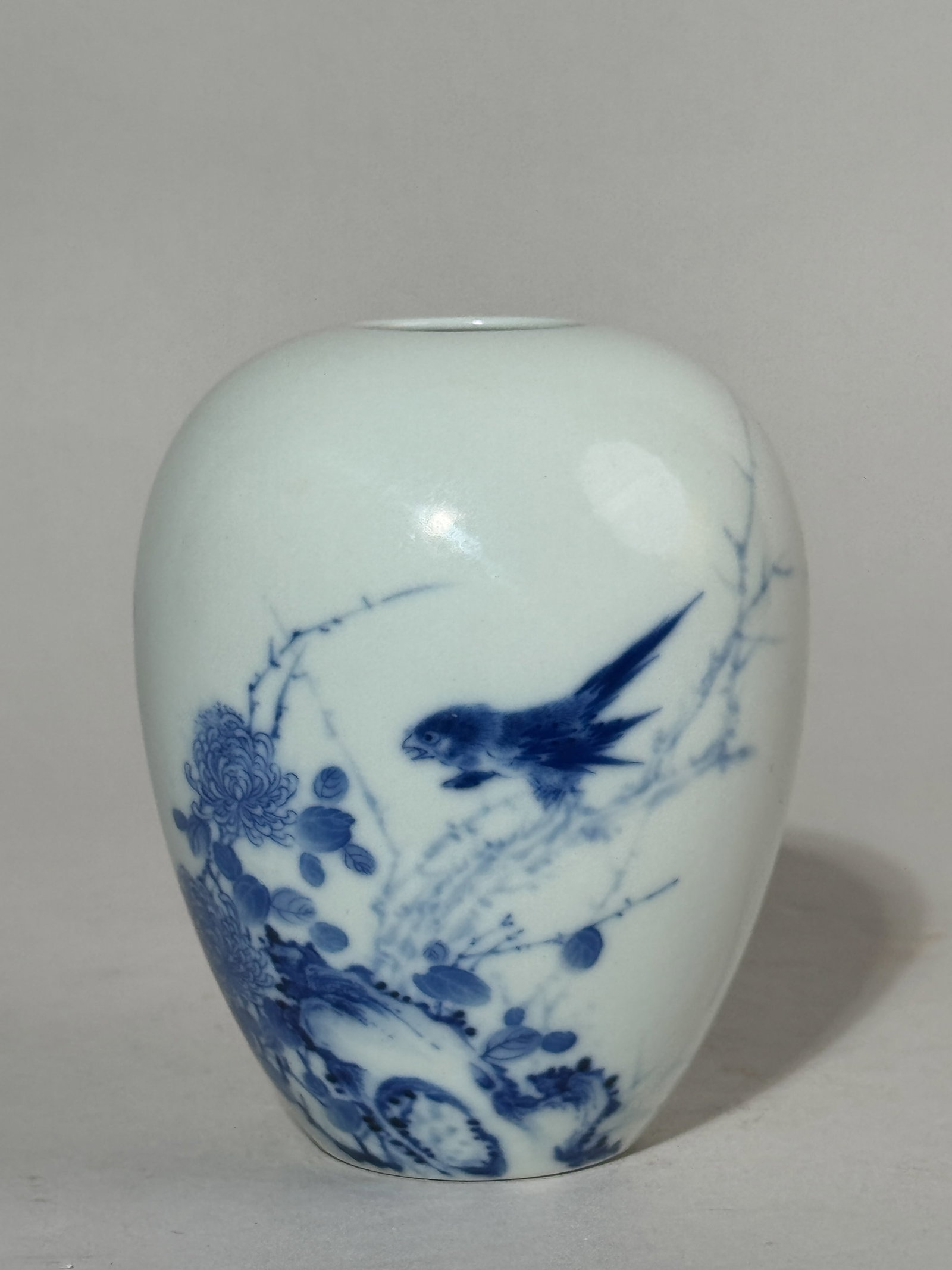 CHINESE BLUE AND WHITE PORCELAIN VASE WITH BIRD: A Chinese blue and white porcelain vase with a bird motif. Dimensions: Height: 4.25 in. (10.8 cm). Note: This item is in New York, where it can be shipped from.