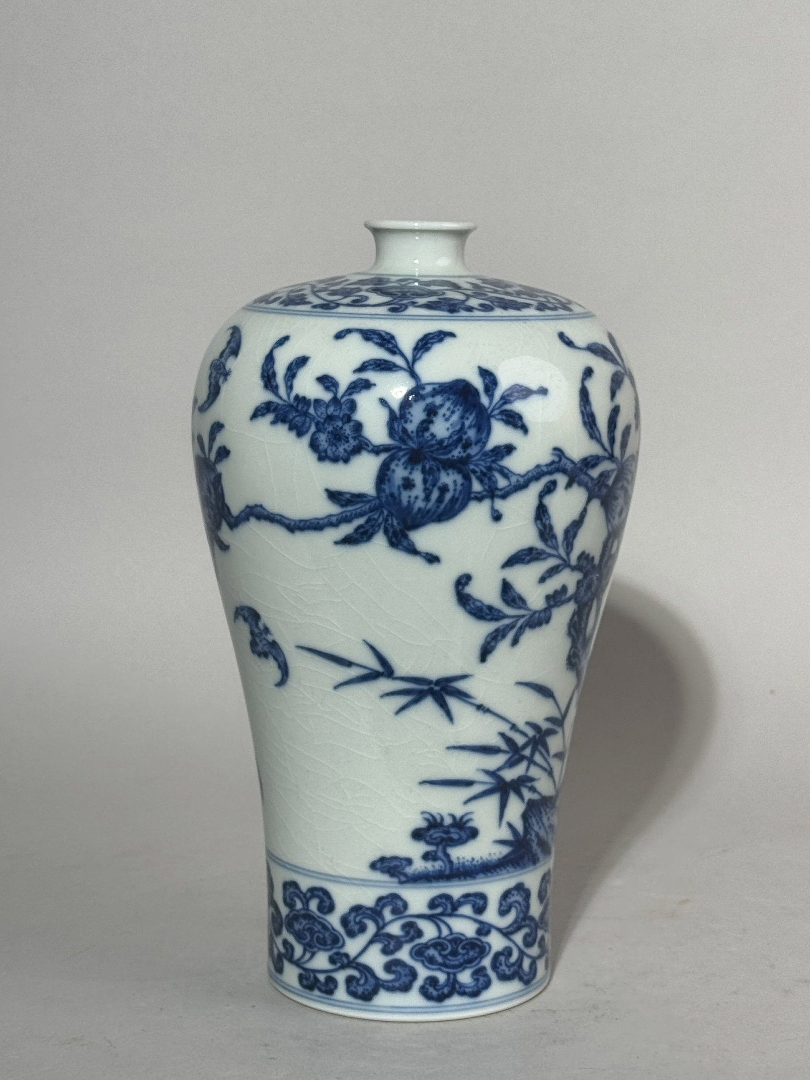 CHINESE BLUE AND WHITE PORCELAIN MEIPING: A Chinese blue and white porcelain Meiping decorated with a peach scene. Dimensions: Height: 8.75 in. (22.2 cm). Note: This item is in New York, where it can be shipped from.