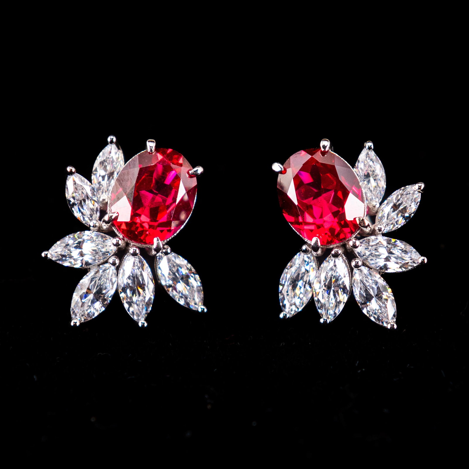 Lab-Grown Ruby, Diamond and Sterling Silver Earrings: (Lot of 2) Lab-grown ruby, diamond and sterling silver earrings. NOTE: THIS ITEM IS IN LOS ANGELES.