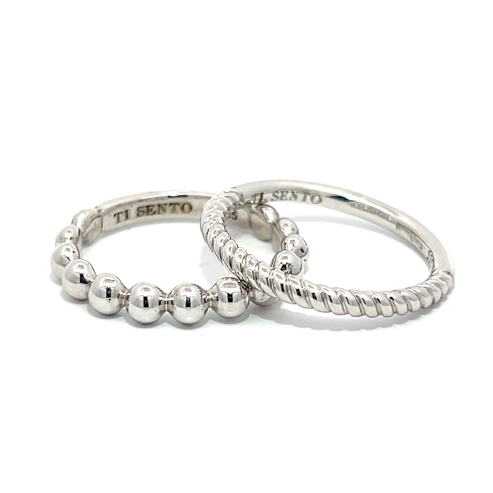 (LOT OF 2) A GROUP OF TI SENTO SILVER RINGS: (lot of 2) A group of TI SENTO silver rings. Overall 3 grams; size 5.5 & 6.25