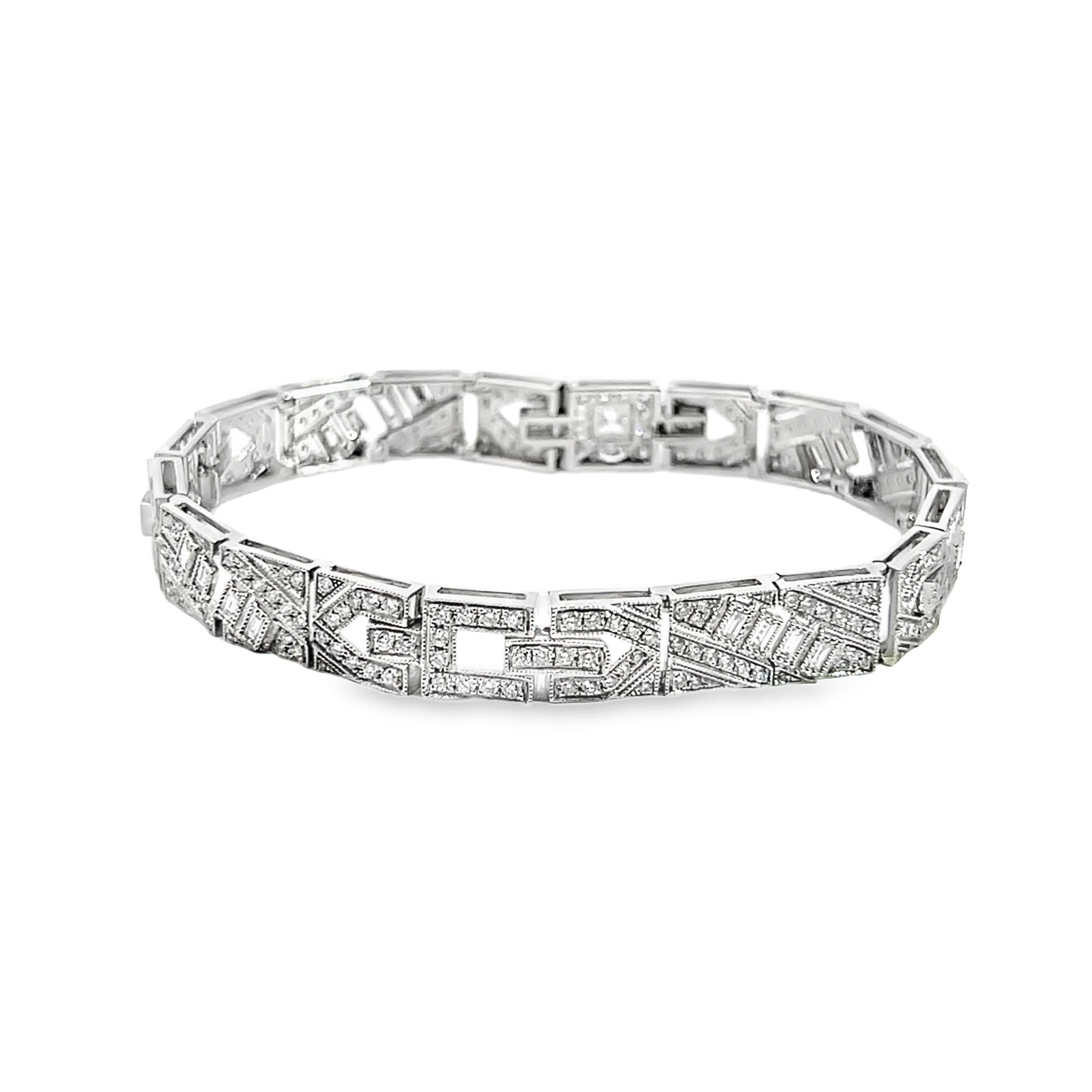 Diamond and 18k White Gold Bracelet: Extraodinary art deco diamond and 18k white gold bracelet. 6.1"l (15.5 cm); 14.2 grams