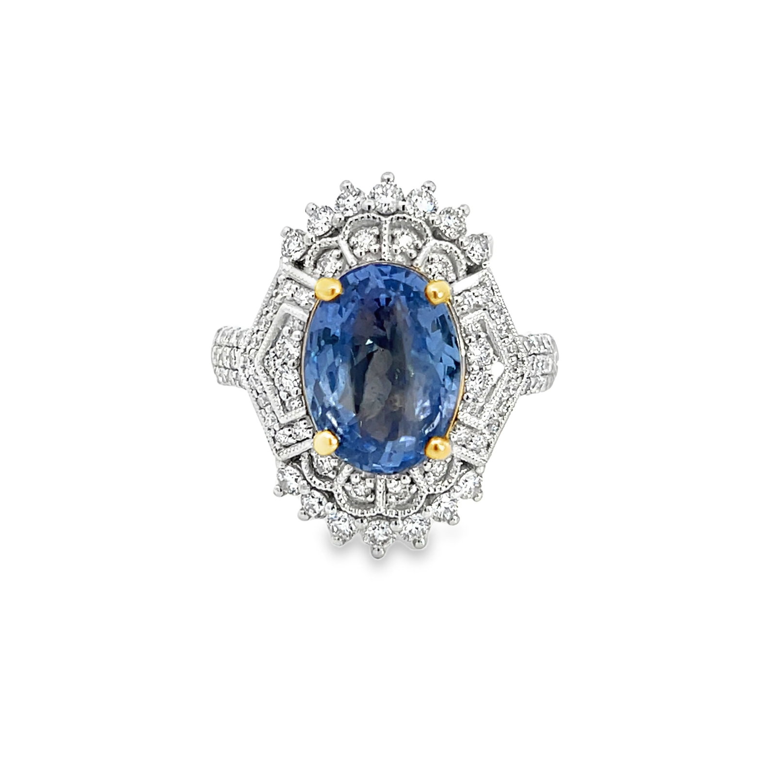 Platinum, 18K Gold, Natural Sapphire and Diamond Ring with GGA & GIA: Platinum, 18K Gold, Natural Sapphire and Diamond Ring with GGA & GIA. 8.6 grams platinum and 18K gold ring set with 0.80 carats of diamonds and 5.03 carats natural sapphire (GGA/GIA). 