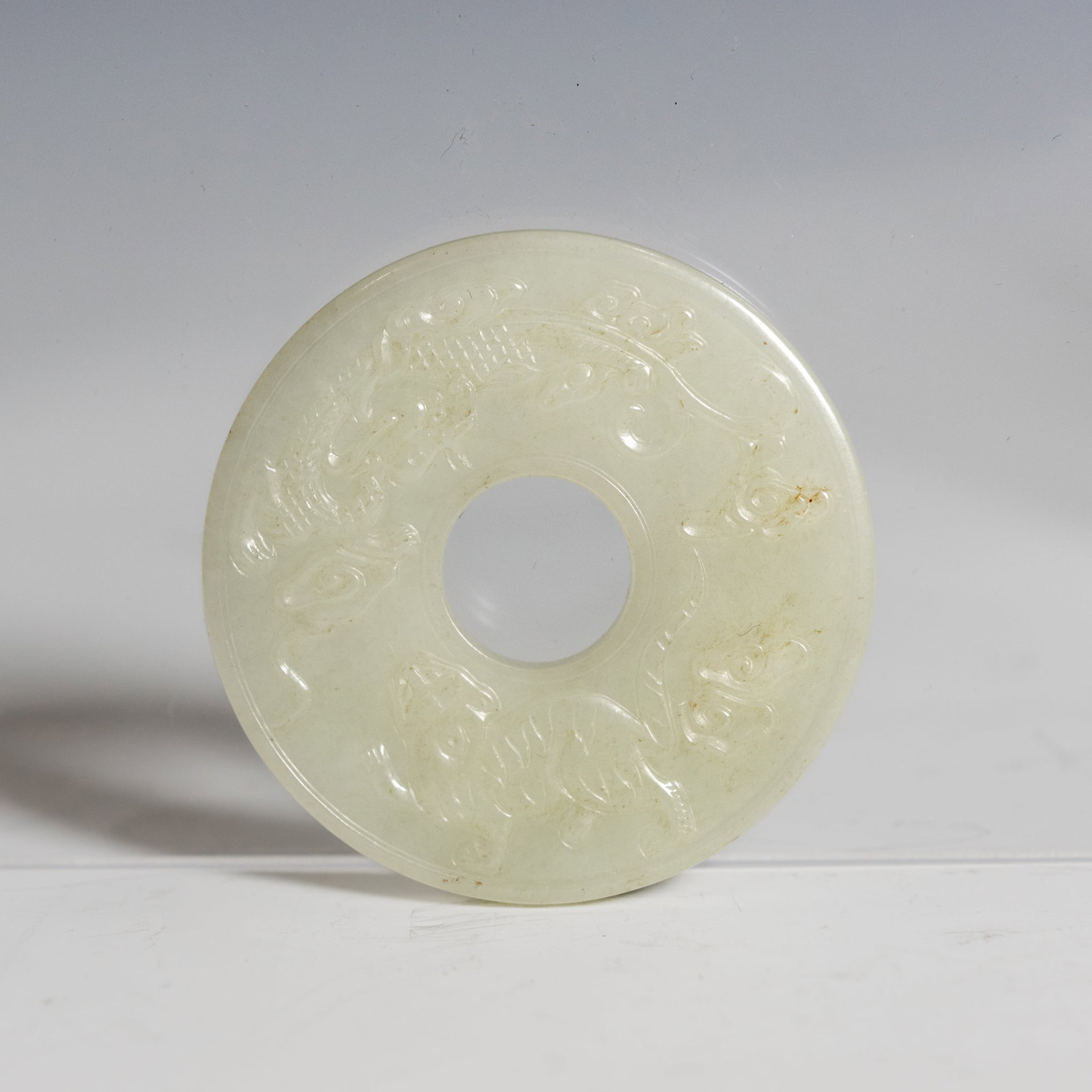 A CHINESE CARVED JADE BI DISC PLAQUE (1 of 5)