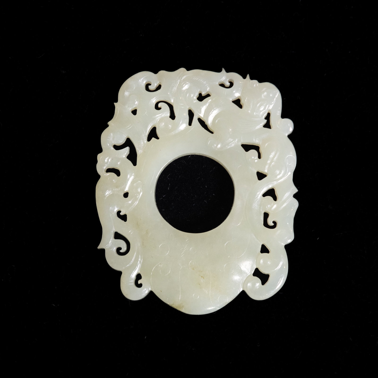 A WHITE JADE OPENWORK PENDANT (1 of 4)
