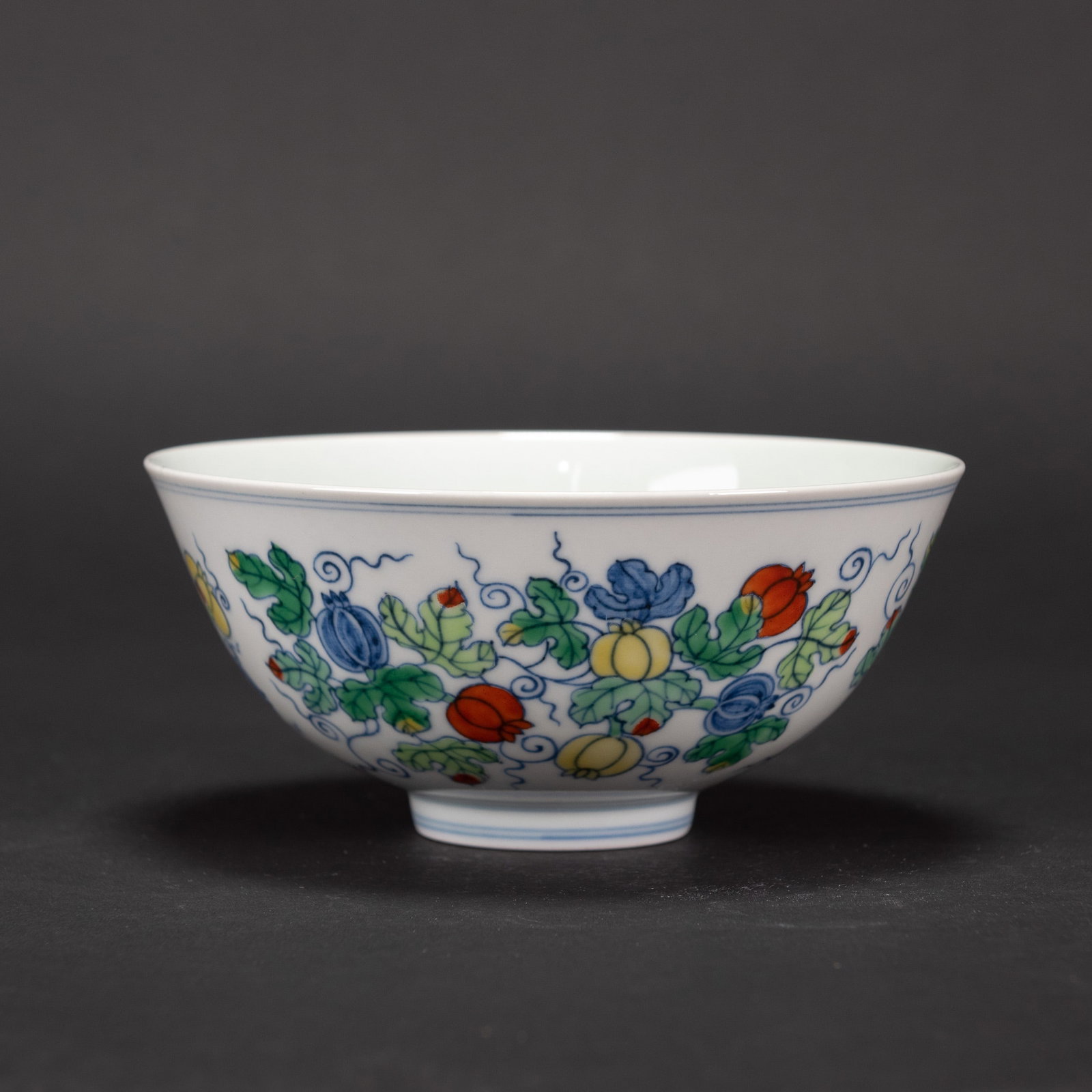 A DOUCAI 'FLORAL' BOWL, CHENGHUA MARK: A Doucai 'floral' bowl, Chenghua mark. 6.1"d x 2.76"h (15.5 x 7 cm)