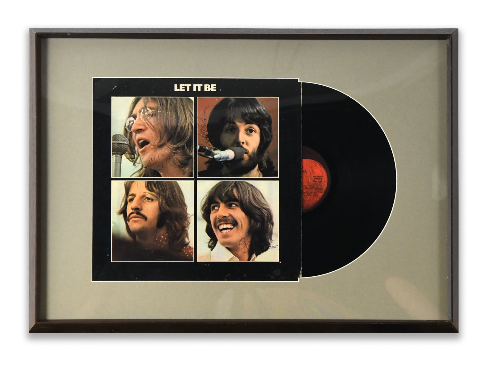 THE BEATLES FRAMED ALBUM DISPLAY "LET IT BE", BEARING SIGNATURES: A framed album display for "Let It Be". The display bears multiple ink marks.