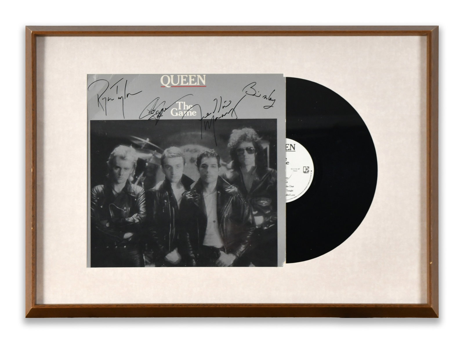 QUEEN FRAMED ALBUM DISPLAY "THE GAME", BEARING SIGNATURES: A framed album display for "The Game". The display bears multiple ink marks.