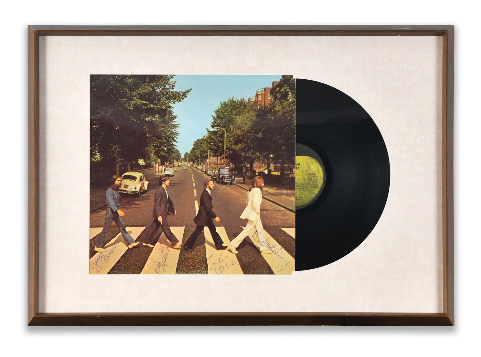 THE BEATLES FRAMED ALBUM DISPLAY "ABBEY ROAD", BEARING SIGNATURES: A framed album display for "Abbey Road". The display bears multiple ink marks.