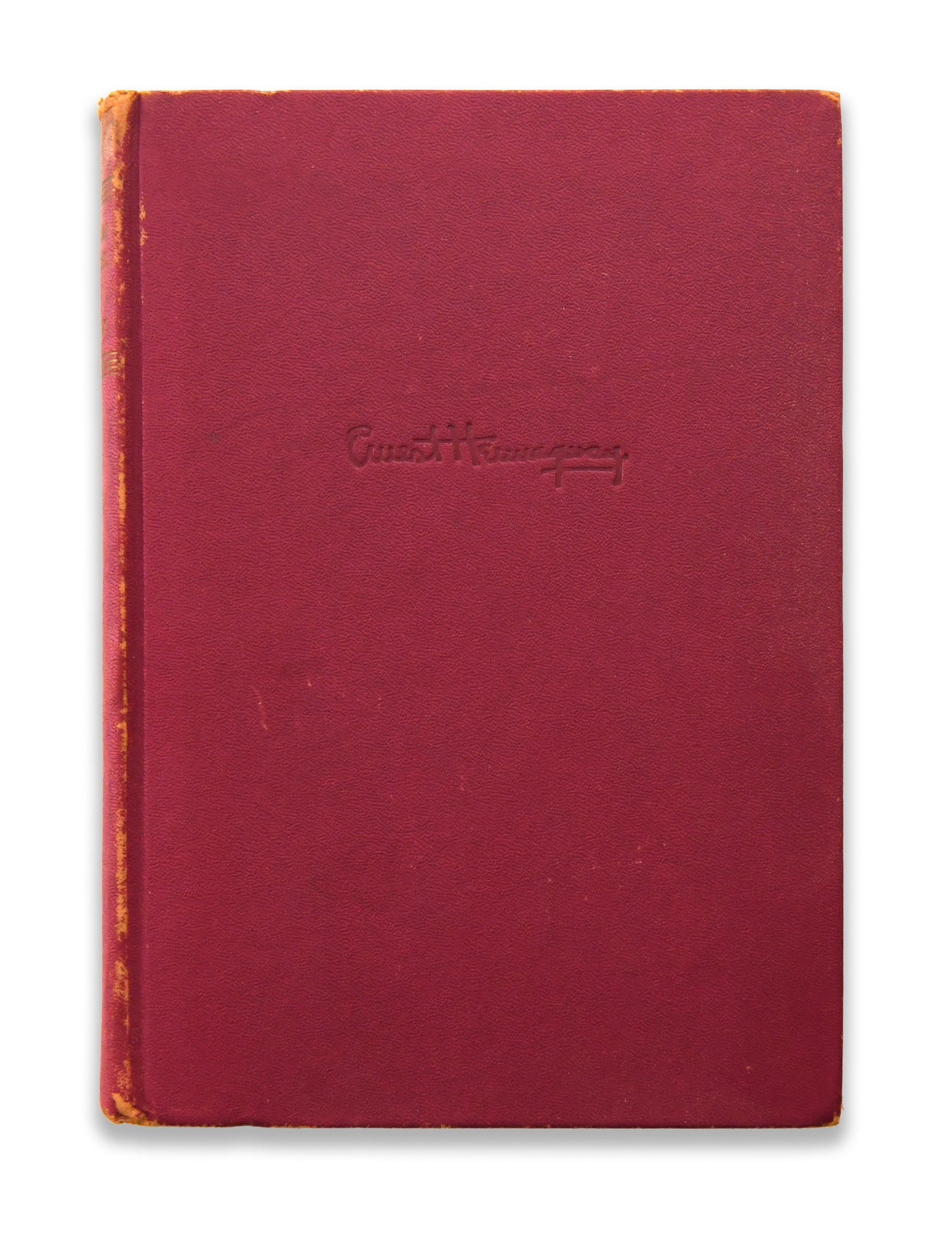 ERNEST HEMINGWAY BOOK "FOR WHOM THE BELL TOLLS", BEARING SIGNATURE: A book titled "For Whom the Bell Tolls". The book bears an ink mark.