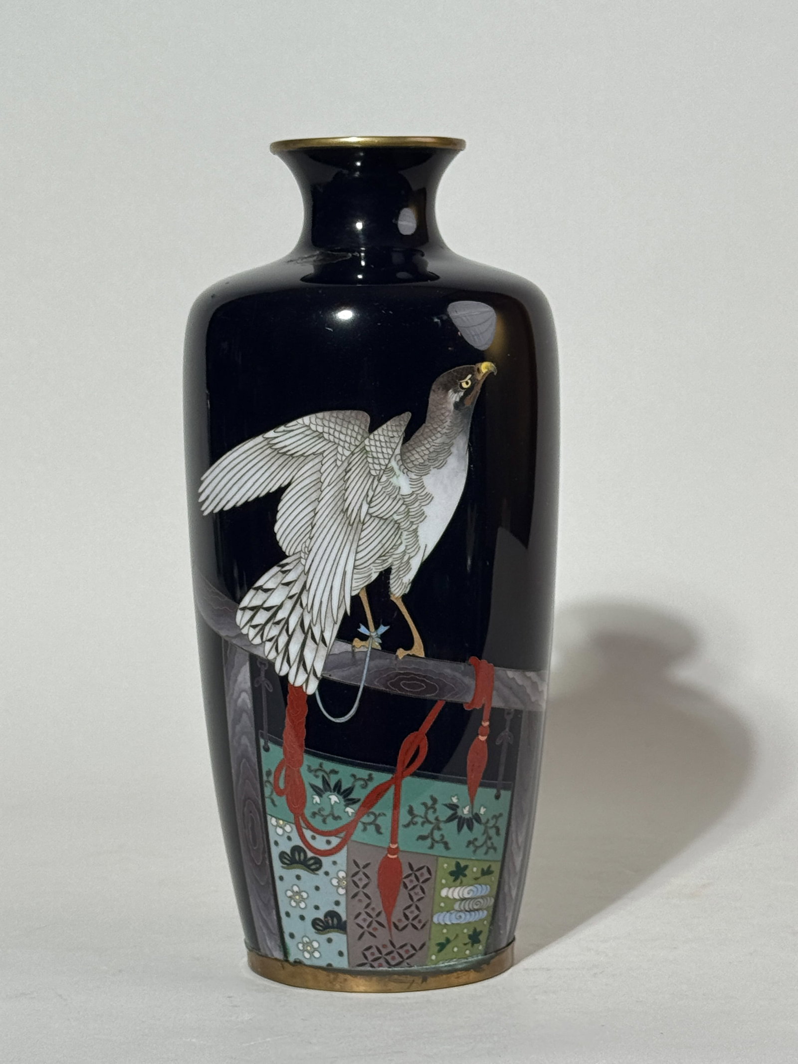 JAPANESE CLOISONNE VASE WITH HAWK: A Japanese Meiji period cloisonne vase with a hawk scene. One old repair as seen in the photo on the shoulder of the vase. Dimensions: Height: 8.6 in. (21.8 cm). Note: This item is in New York, where 