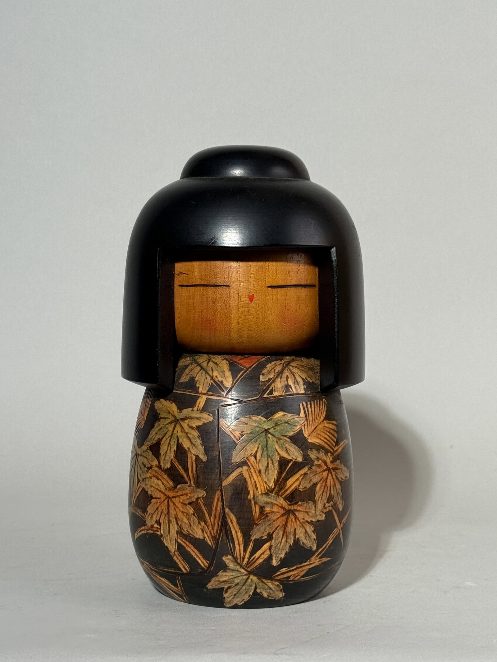 JAPANESE HAND-PAINTED WOOD DOLL SIGNED: A Japanese hand-painted wood doll, signed. Dimensions: Height: 8.5 in. (21.6 cm). Note: This item is in New York, where it can be shipped from.