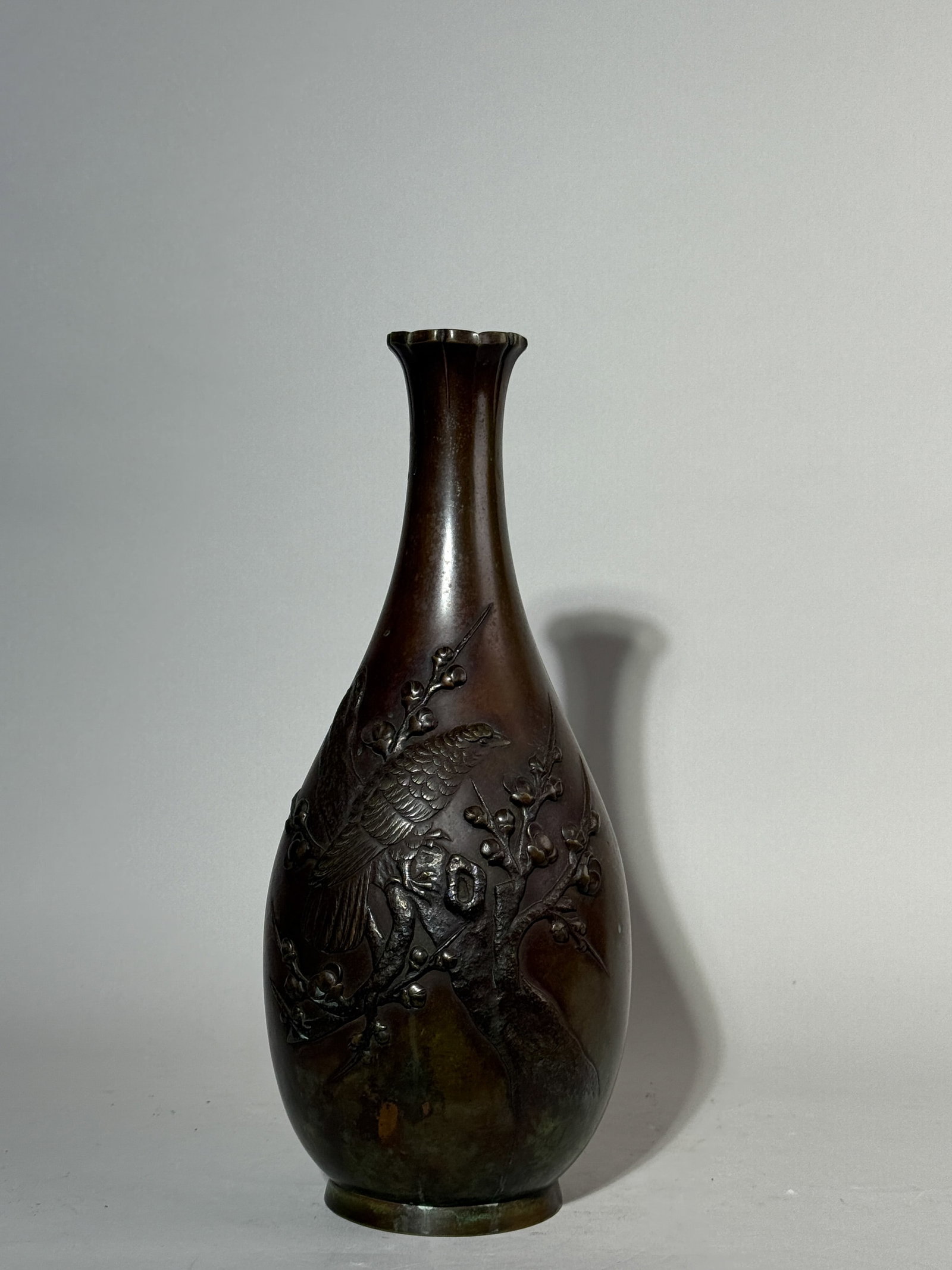 JAPANESE MEIJI BRONZE VASE BIRD ON BRANCH: A Japanese Meiji period bronze vase with a bird on branch scene. Dimensions: Height: 14.25 in. (36.2 cm). Note: This item is in New York, where it can be shipped from.