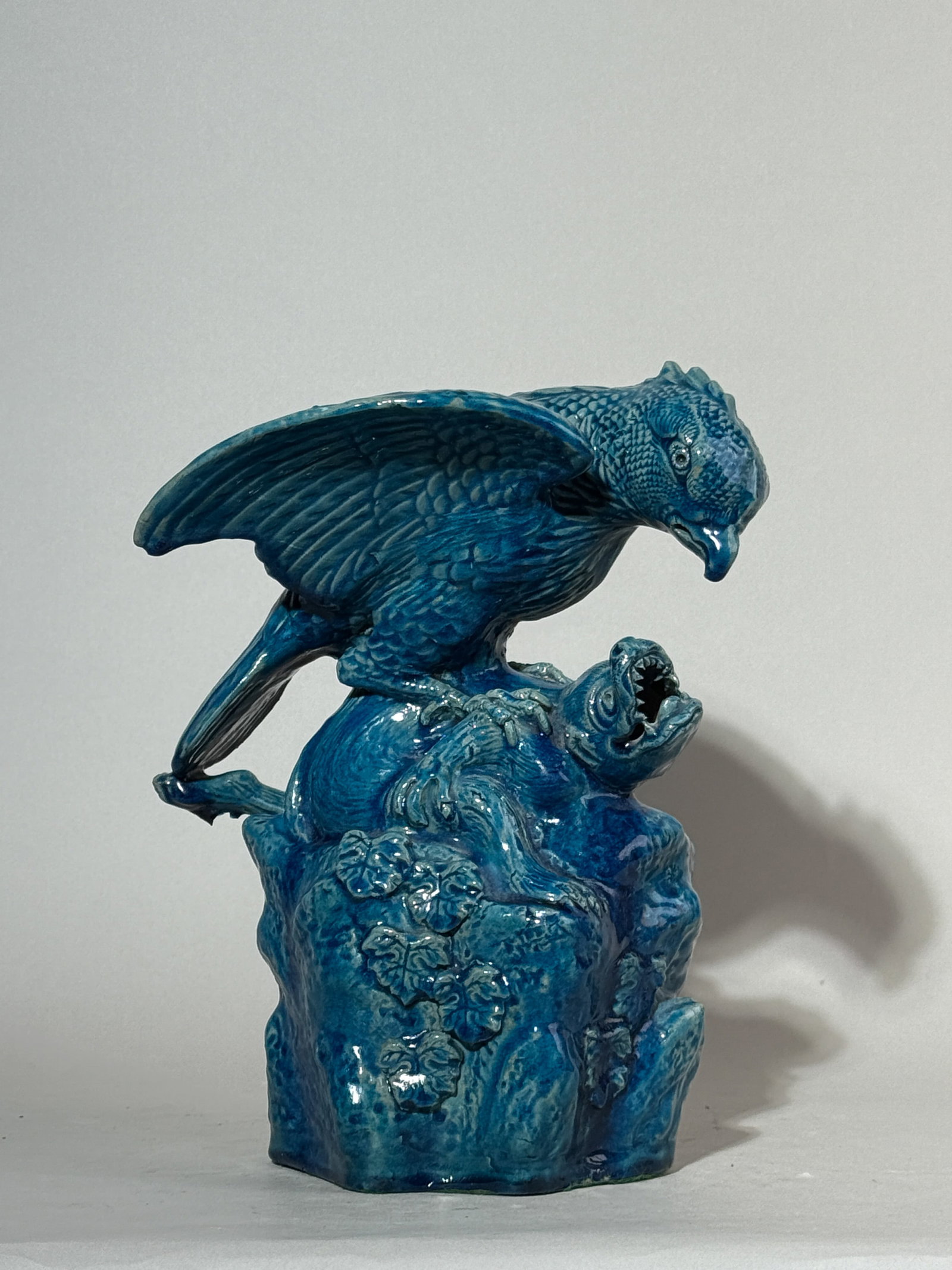 JAPANESE PORCELAIN MODEL OF HAWK AND BEAST: A Japanese porcelain model of a hawk catching a beast. Dimensions: Height: 10 in. (25.4 cm). Note: This item is in New York, where it can be shipped from.