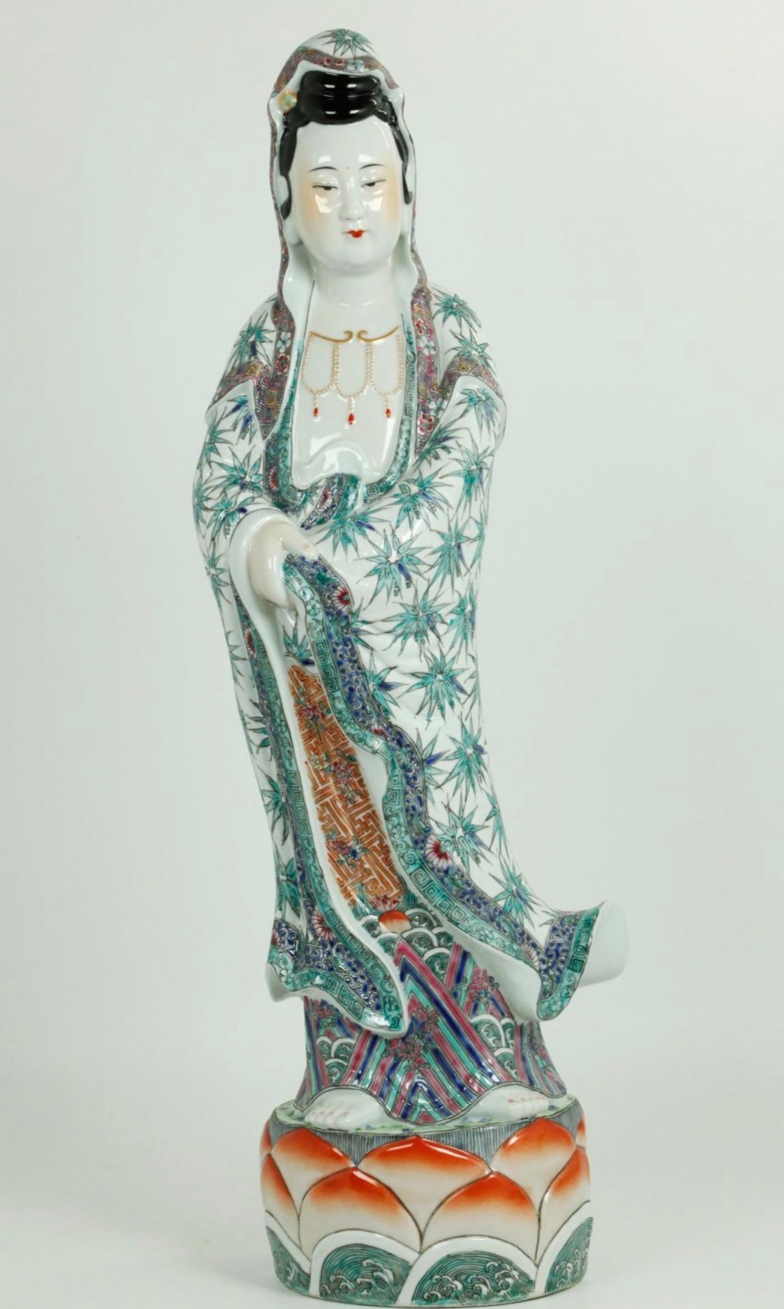 CHINESE FAMILLE ROSE PORCELAIN STANDING KUANYIN: A Chinese Famille Rose standing Kuanyin. Dimensions: Height: 23 in. (58.4 cm). Note: This item is in New York, where it can be shipped from.
