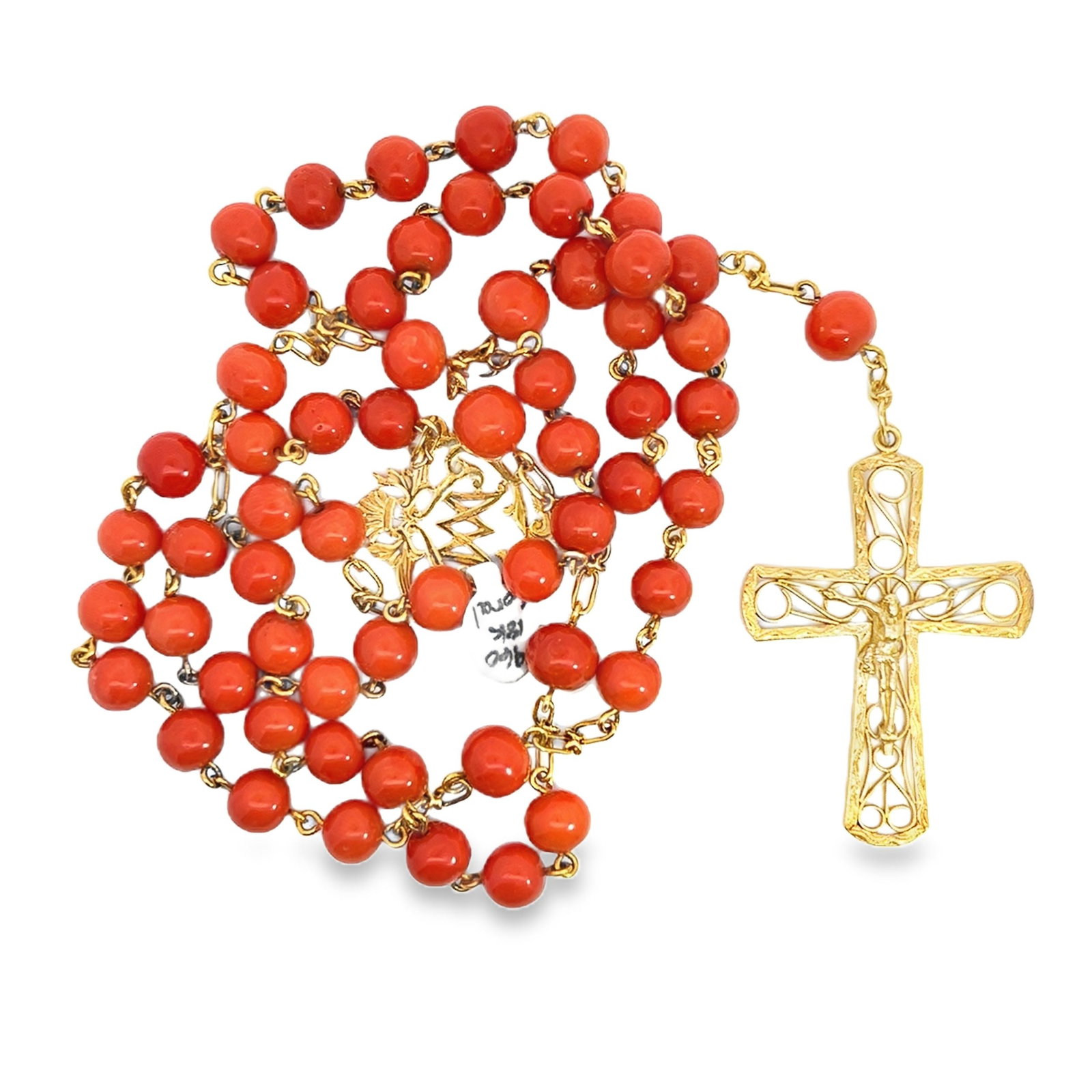 CORAL AND 18K GOLD ROSARY NECKLACE: Coral and 18K gold rosary necklace. Cross: 2.17"h x 1.57"w (5.5 x 4 cm); Overall (with cross): 24.02"l (61 cm)