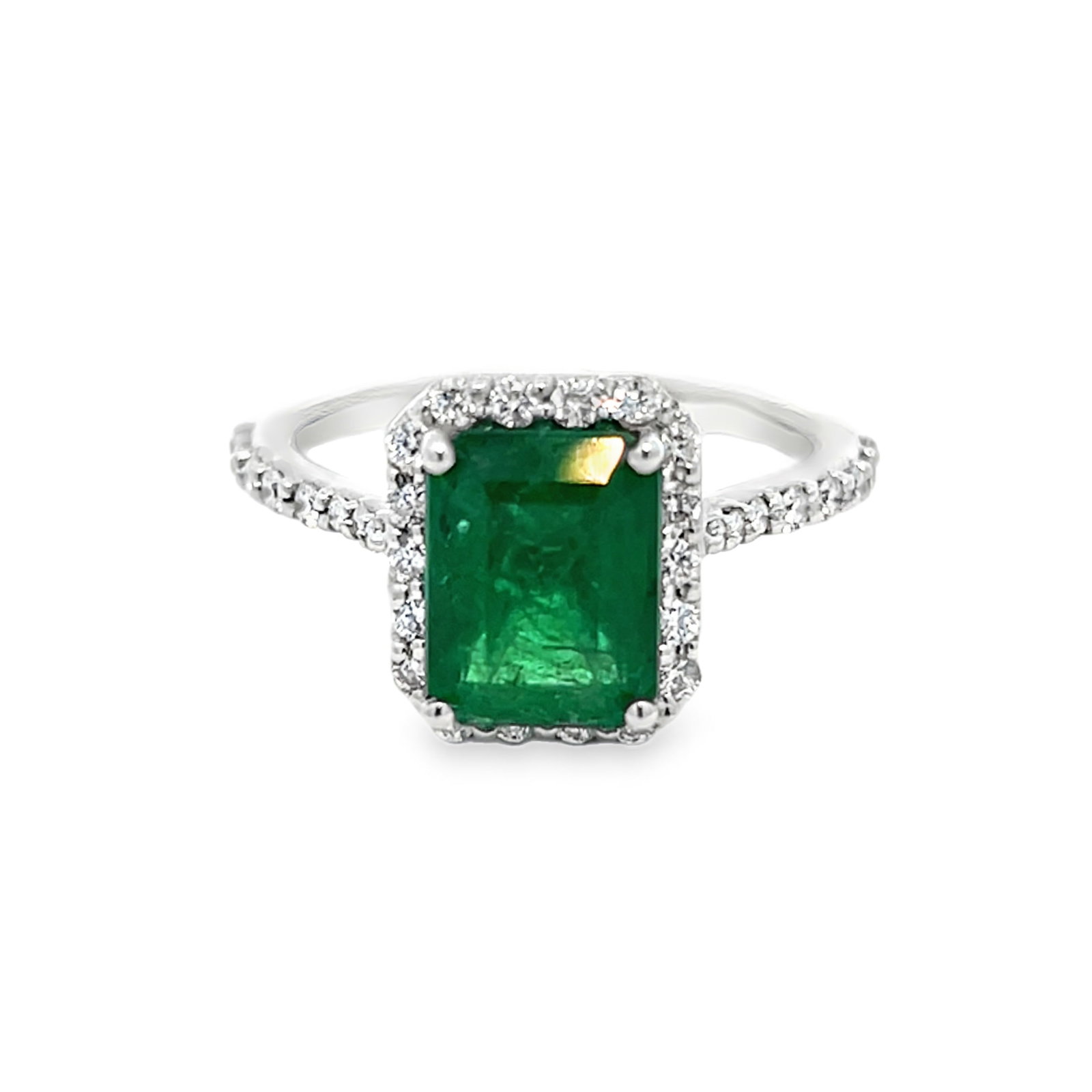 14K GOLD, EMERALD AND DIAMOND RING WITH GGA REPORT: 14K gold, emerald and diamond ring with GGA report. 3.8 grams 14K gold ring set with 0.43 carats of diamonds and 2.63 carats of emerald. Size: 6.75