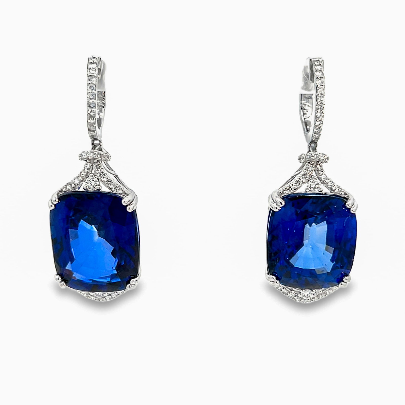 14K GOLD, LAB SAPPHIRE AND DIAMOND EARRINGS WITH GGA REPORT: 14K gold, lab sapphire and diamond earrings with GGA report. 16.9 grams 14K gold earrings set with 0.95 carats of diamonds and 47.79 carats of lab-created sapphire. Overall: 4.5 x 1.5 cm (x2)
