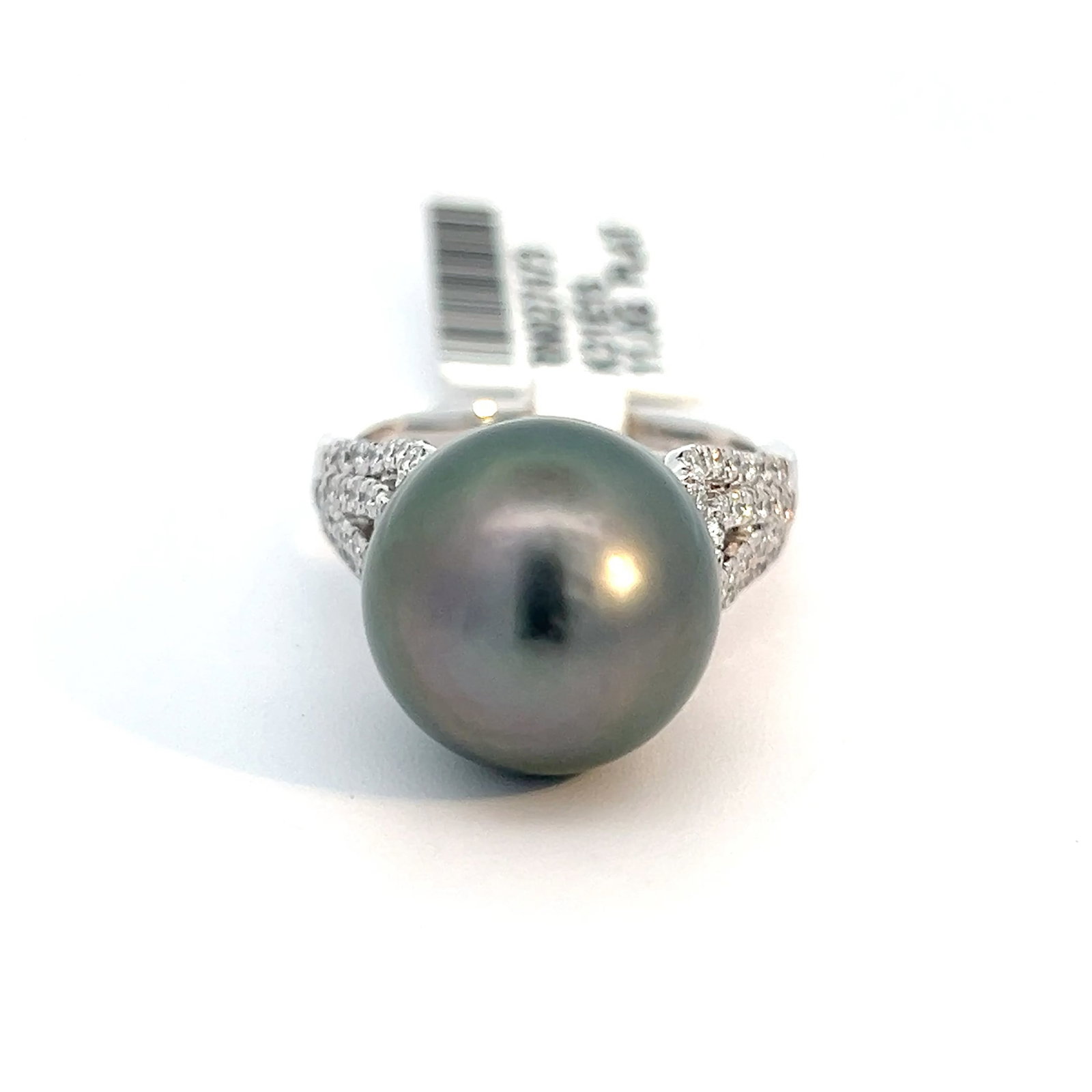 PLATINUM, PEARL AND DIAMOND RING WITH GLA REPORT: Platinum, pearl and diamond ring with GLA report. 11.0 grams platinum ring set with 0.65 carats of diamonds and a pearl. Size: 6.75