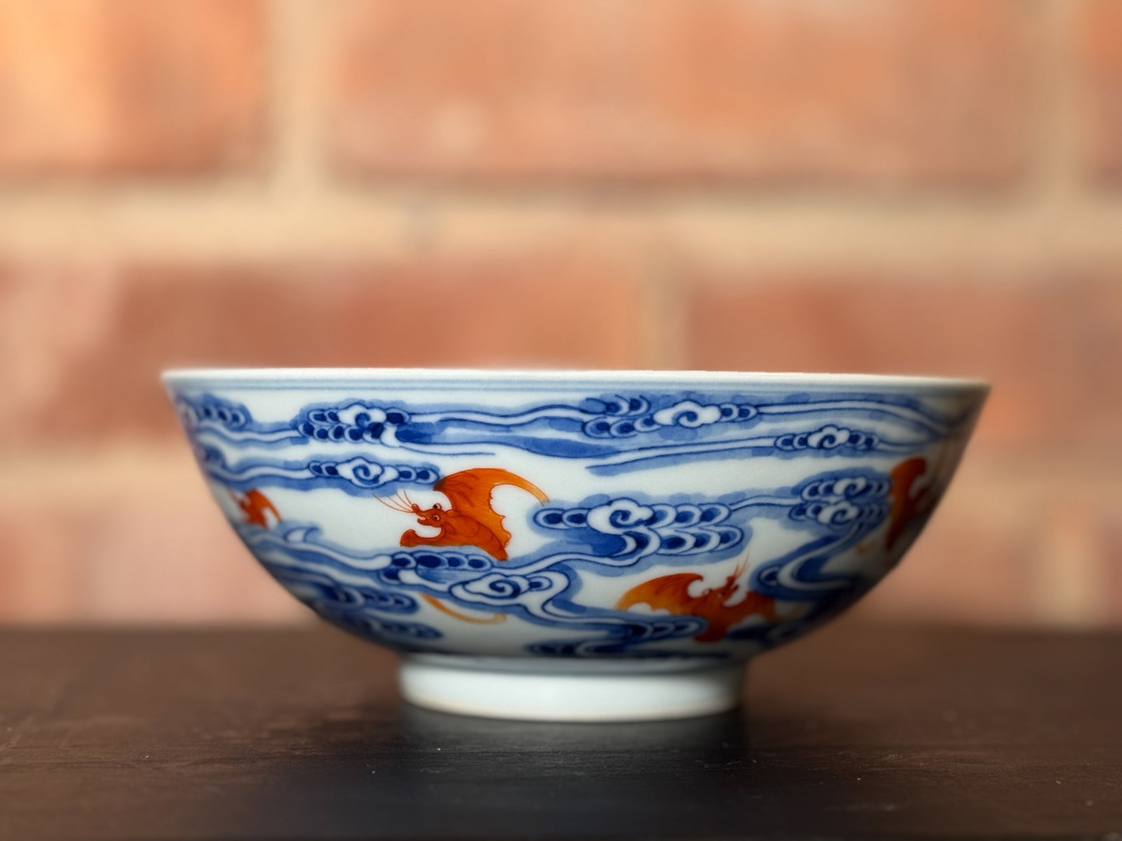 CHINESE PORCELAIN BOWL WITH BATS: Fine Chinese porcelain bowl with bat scene and a four-character underglaze-blue Qinghua Zhenpin mark to the base. Dimensions: Diameter: 6 in. (15.2 cm); Height: 2.25 in. (5.7 cm). Note: This item is i