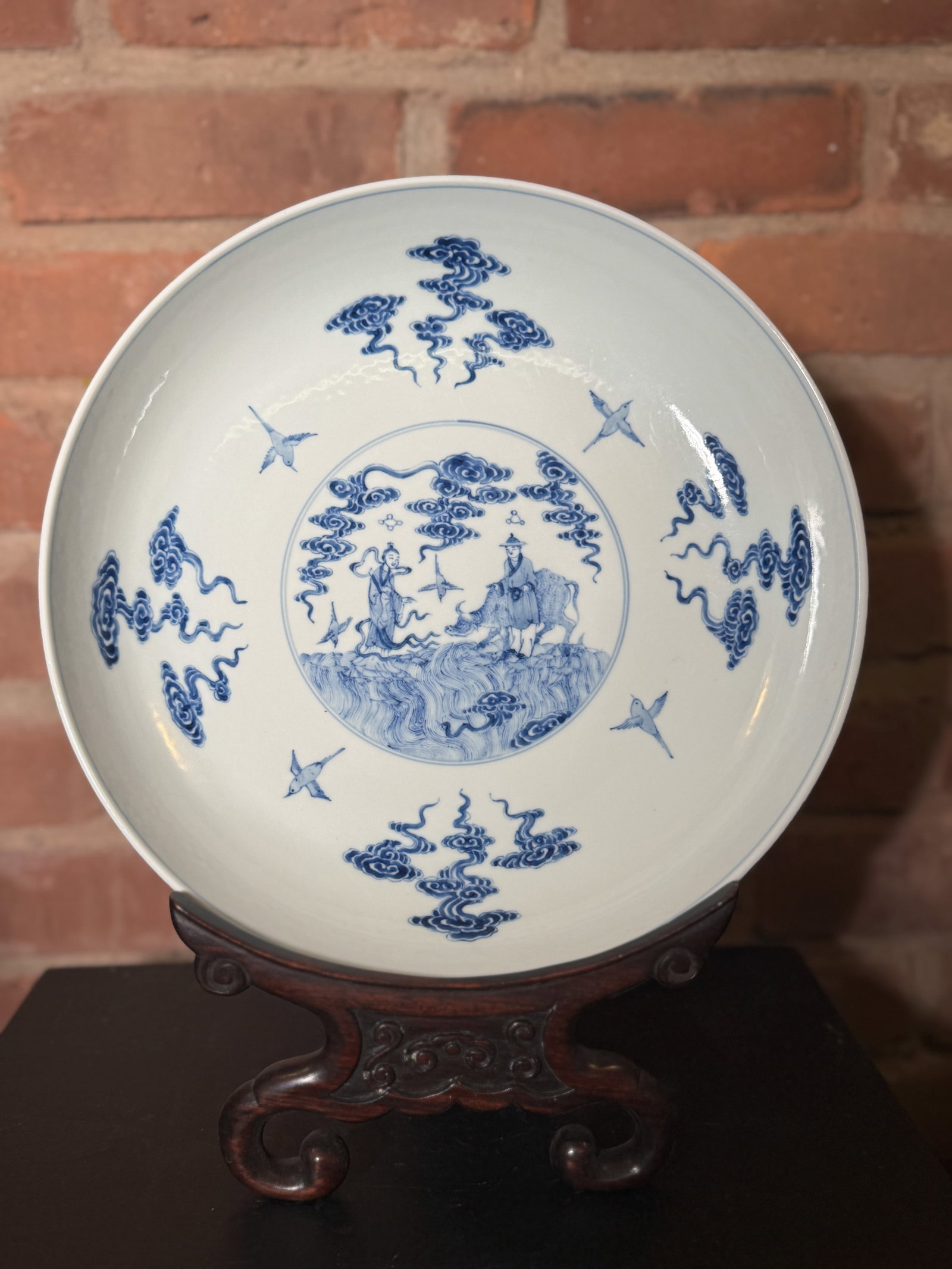 CHINESE BLUE AND WHITE PORCELAIN DISH WITH IMMORTAL SCENE: Chinese blue and white porcelain dish with immortal scene, famille rose decoration on the reverse, and underglaze blue mark. Dimensions: Diameter: 11 in. (27.9 cm). Note: This item is in New York, whe