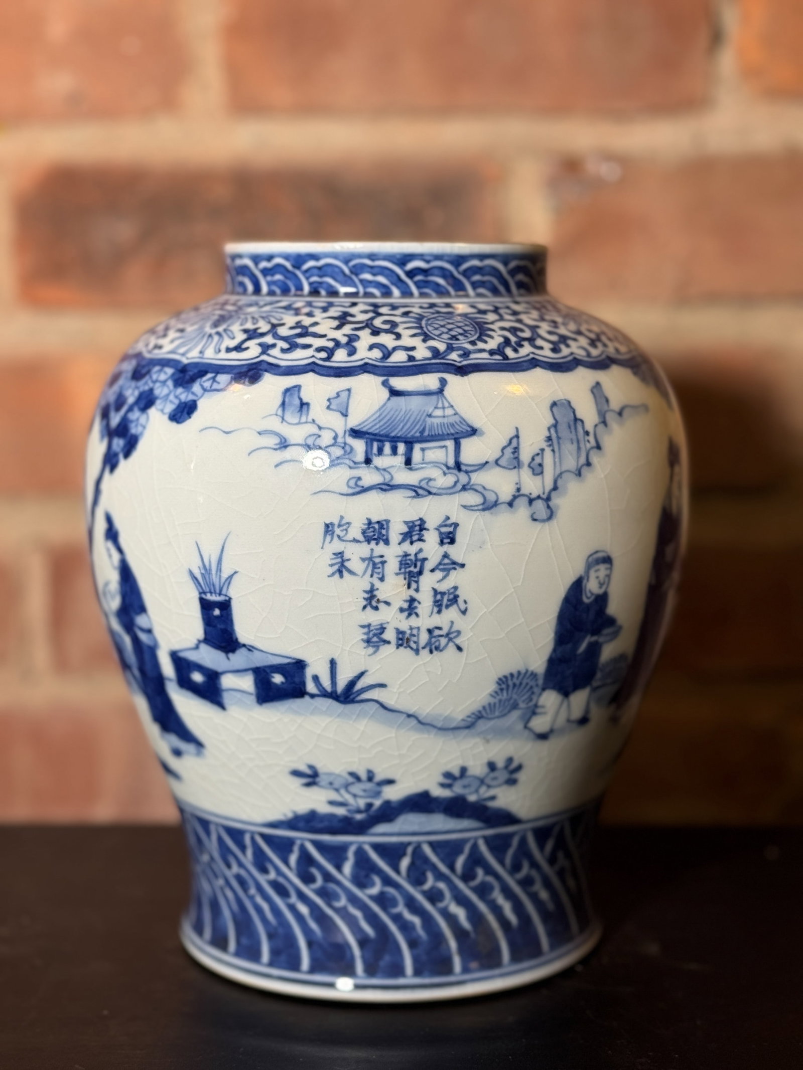 CHINESE BLUE AND WHITE PORCELAIN JAR WITH POEM: Antique Chinese blue and white soft-paste crackle-glazed jar with poem and a four-character mark to the base. Dimensions: Height: 8.5 in. (21.6 cm). Note: This item is in New York, where it can be shi