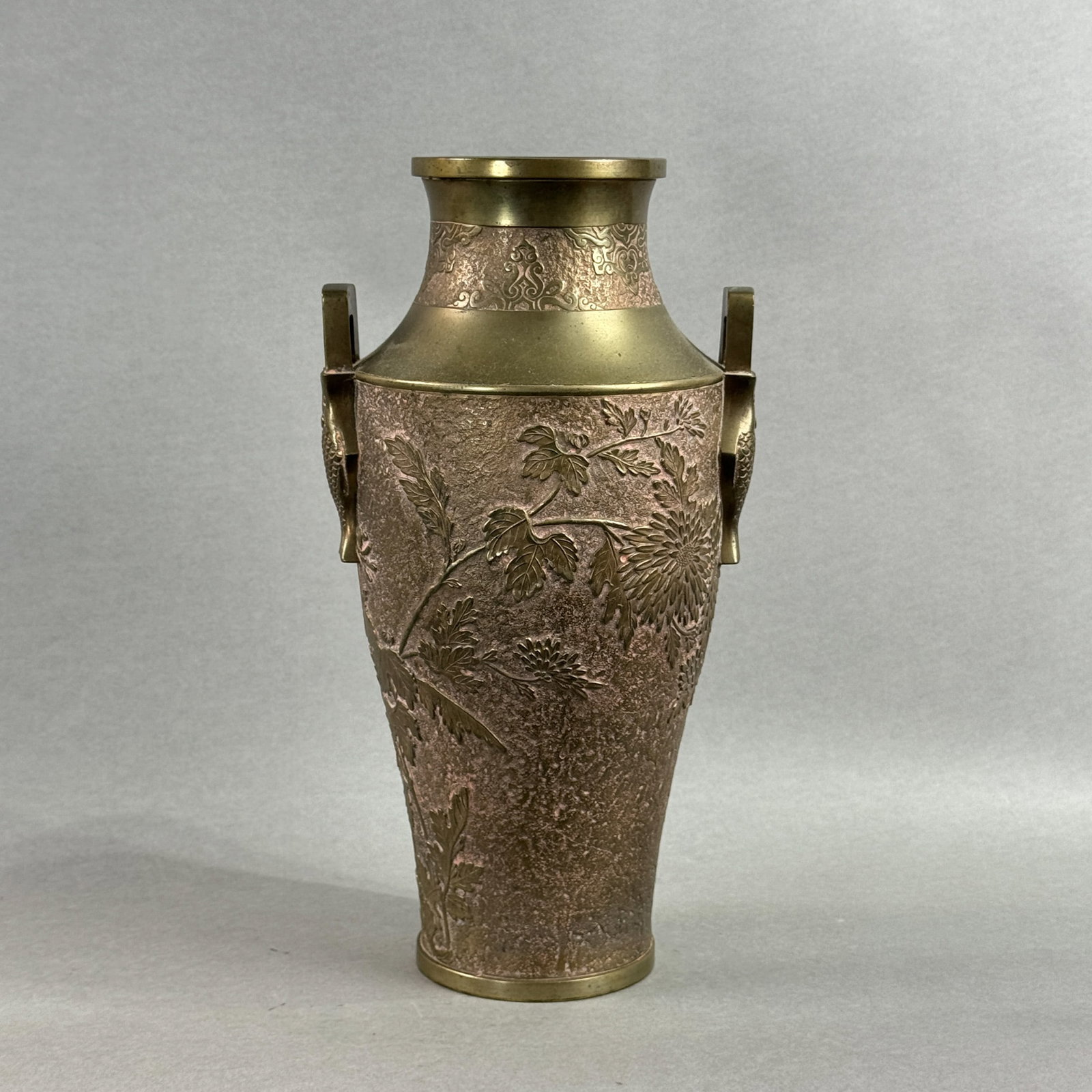 JAPANESE BRONZE VASE WITH DOUBLE-FISH HANDLES: Japanese bronze vase with double-fish handles, Meiji period. Dimensions: Height: 12 in. (30.5 cm). Note: This item is in New York, where it can be shipped from.