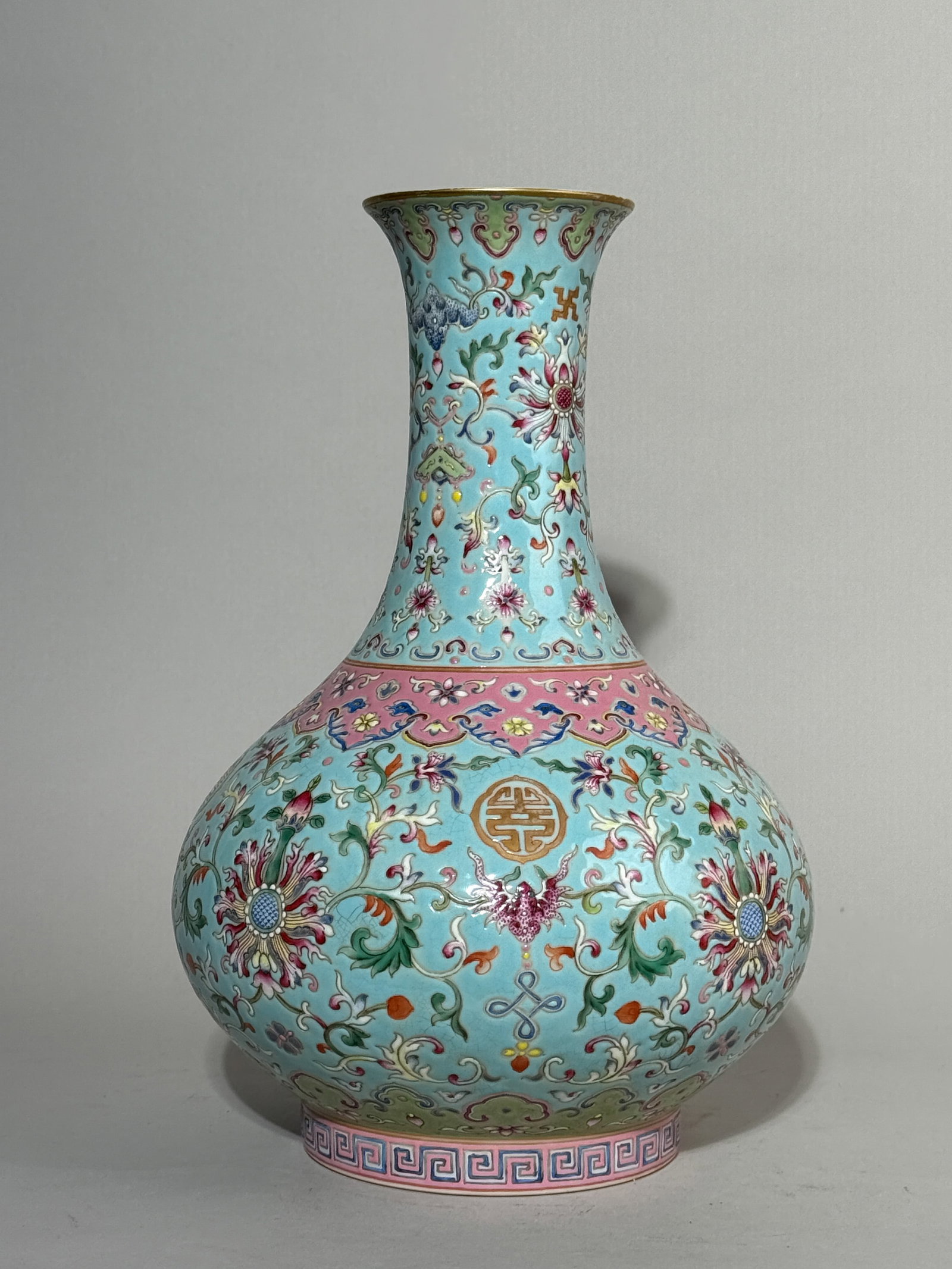 CHINESE TURQUOISE FAMILLE ROSE PORCELAIN VASE: Chinese turquoise famille rose porcelain vase. Dimensions: Height: 12 in. (30.5 cm). Note: This item is in New York, where it can be shipped from.