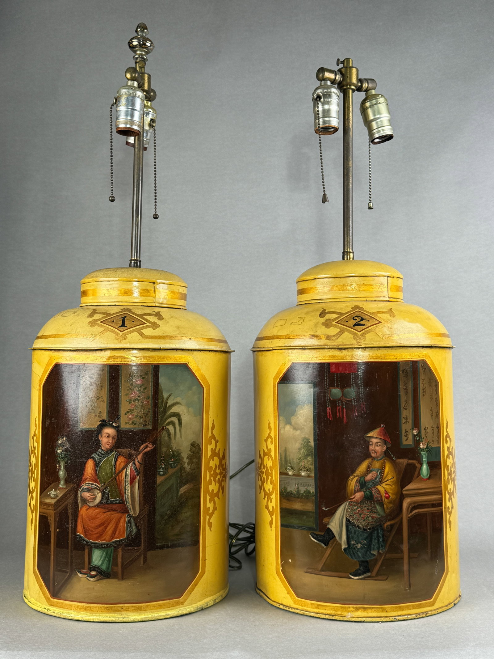 PAIR CHINESE EXPORT TEA CADDIES WITH OIL PAINTING: Pair of Chinese export tea caddies with oil painting, mounted as lamps. Dimensions: Tea Caddy Height: 15 in. (38.1 cm); Overall Height: 28 in. (71.1 cm). Note: This item is in New York, where it can b