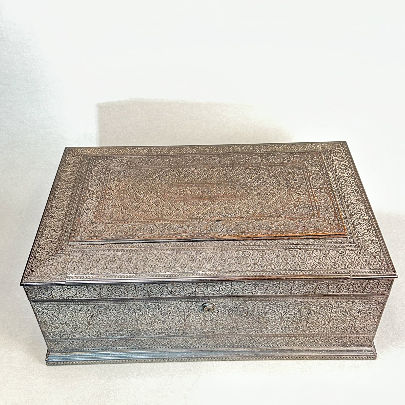 ANGLO-INDIAN ROSEWOOD DOCUMENT BOX: 19th century. Antique Anglo-Indian rosewood box with floral vine motif and inlaid brass lock. Missing key. Dimensions: Width: 18 in. (45.7 cm); Depth: 11 in. (27.9 cm); Height: 7.5 in. (19.1 cm). Note