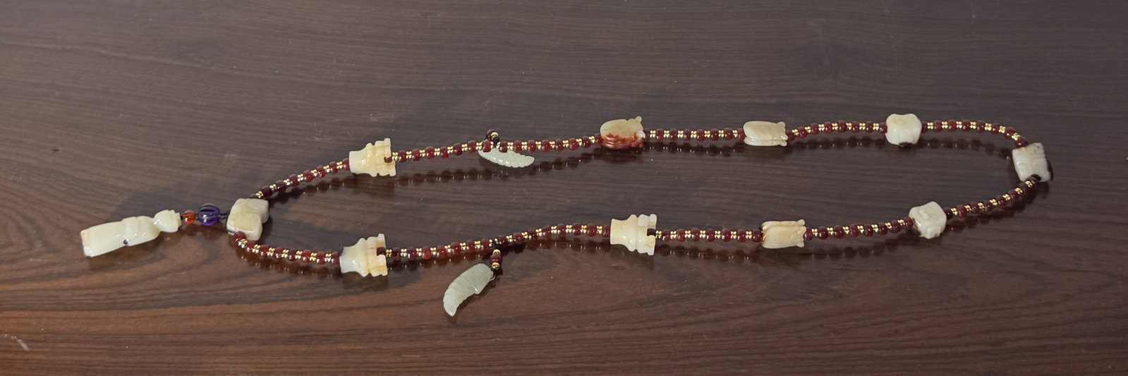 CHINESE ARCHAIC JADE NECKLACE: Chinese archaic jade necklace. Dimensions: Circumference: 36 in. (91.4 cm). Note: This item is in New York, where it can be shipped from.