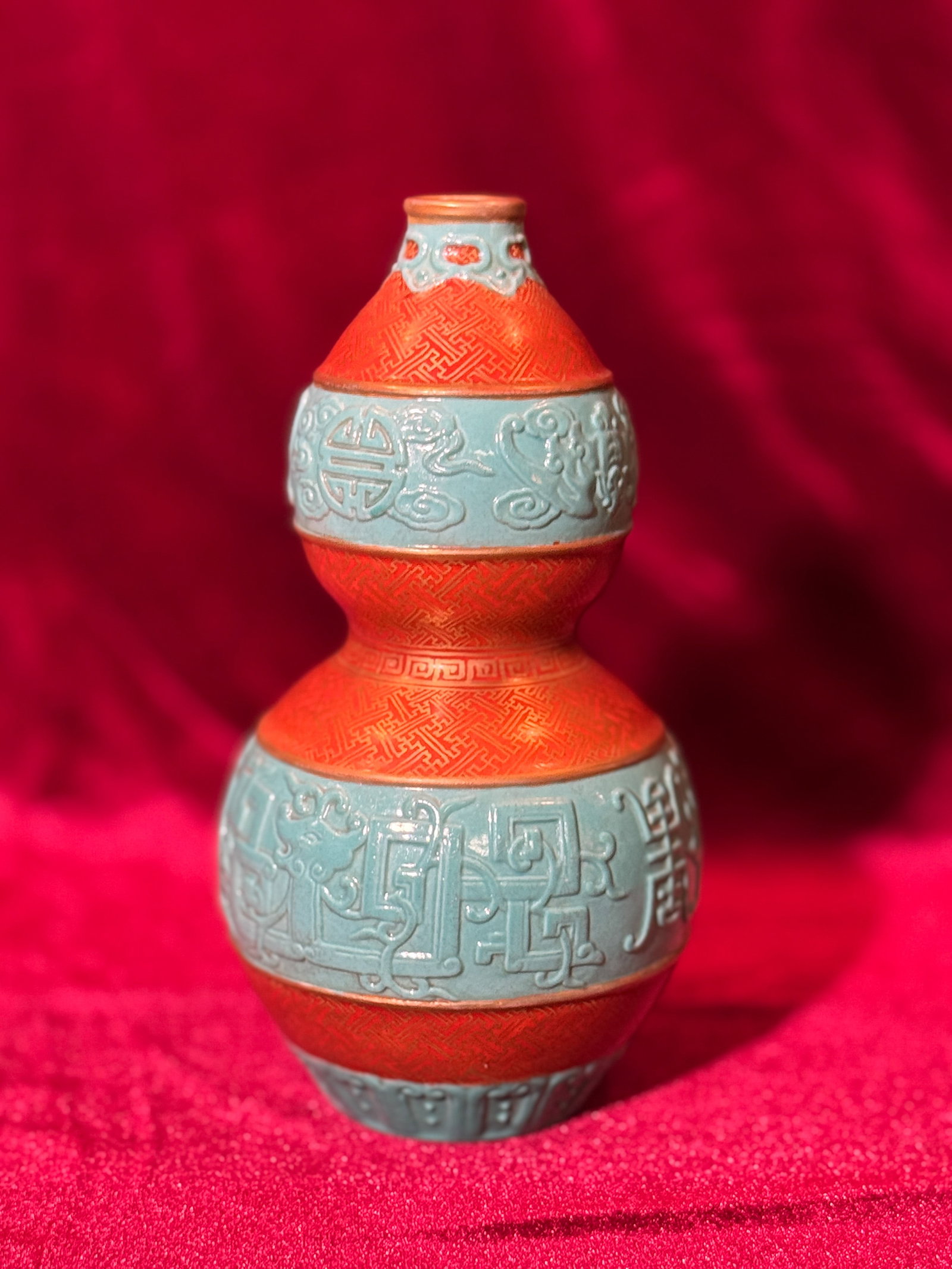 CHINESE DOUBLE-GOURD PORCELAIN VASE WITH MOLDED DESIGN: Chinese double-gourd porcelain vase with molded design and gilt mark. Dimensions: Height: 6.25 in. (15.9 cm). Note: This item is in New York, where it can be shipped from.