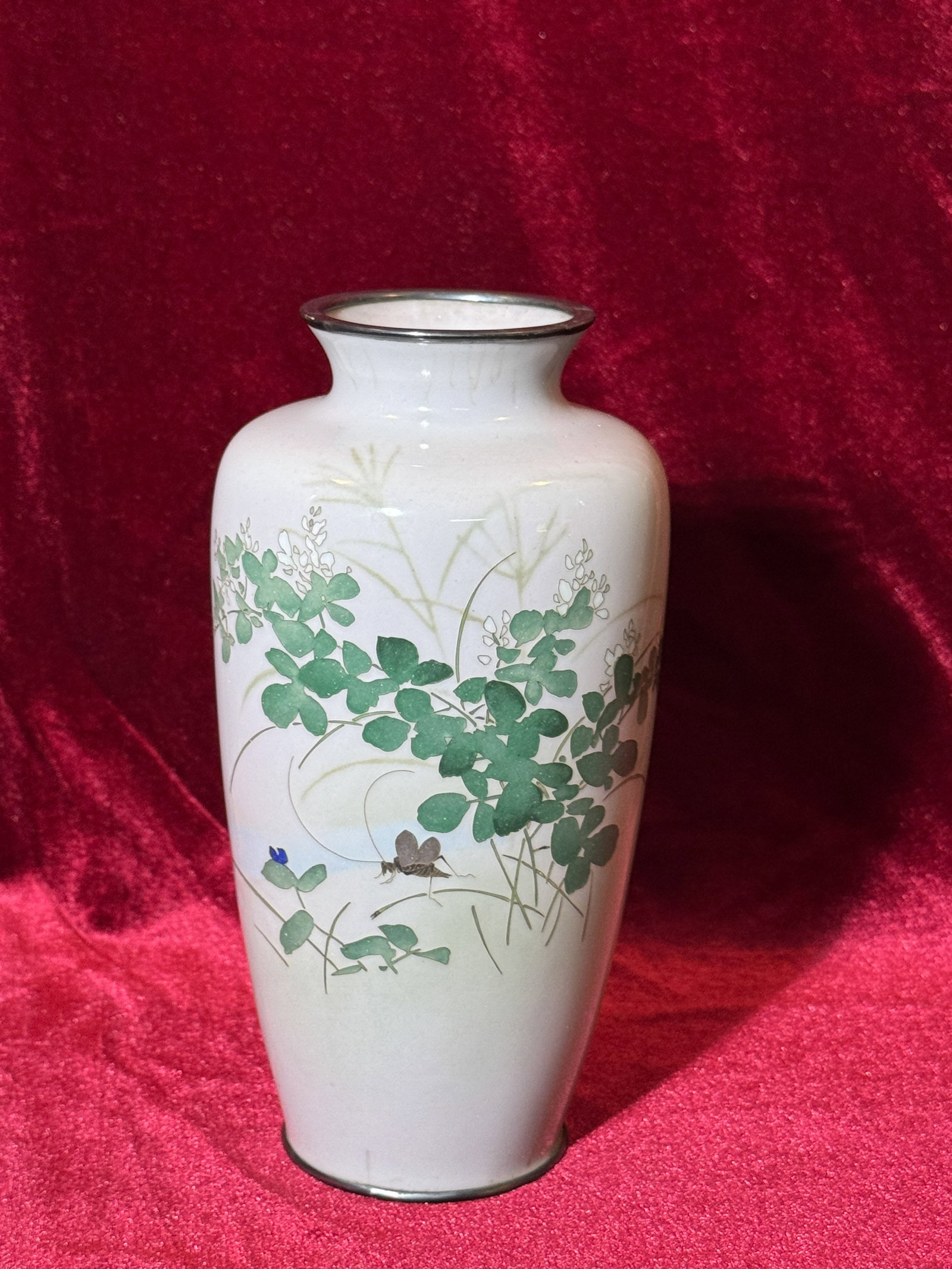JAPANESE CLOISONNE VASE WITH INSECT, SIGNED: Japanese cloisonne vase, signed, with insect and floral motif. Hairline as seen in the photo. Dimensions: Height: 7.2 in. (18.3 cm). Note: This item is in New York, where it can be shipped from.