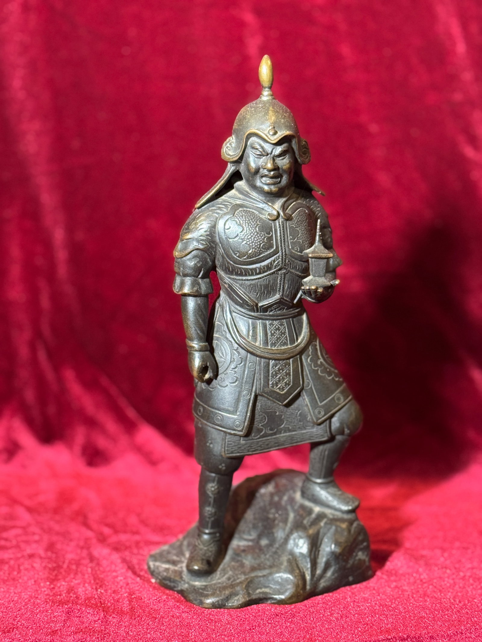 JAPANESE MEIJI BRONZE WARRIOR WITH PAGODA IN HAND: Japanese Meiji bronze warrior with pagoda in hand. Previously mounted as a lamp. Dimensions: Height: 10 in. (25.4 cm). Note: This item is in New York, where it can be shipped from.