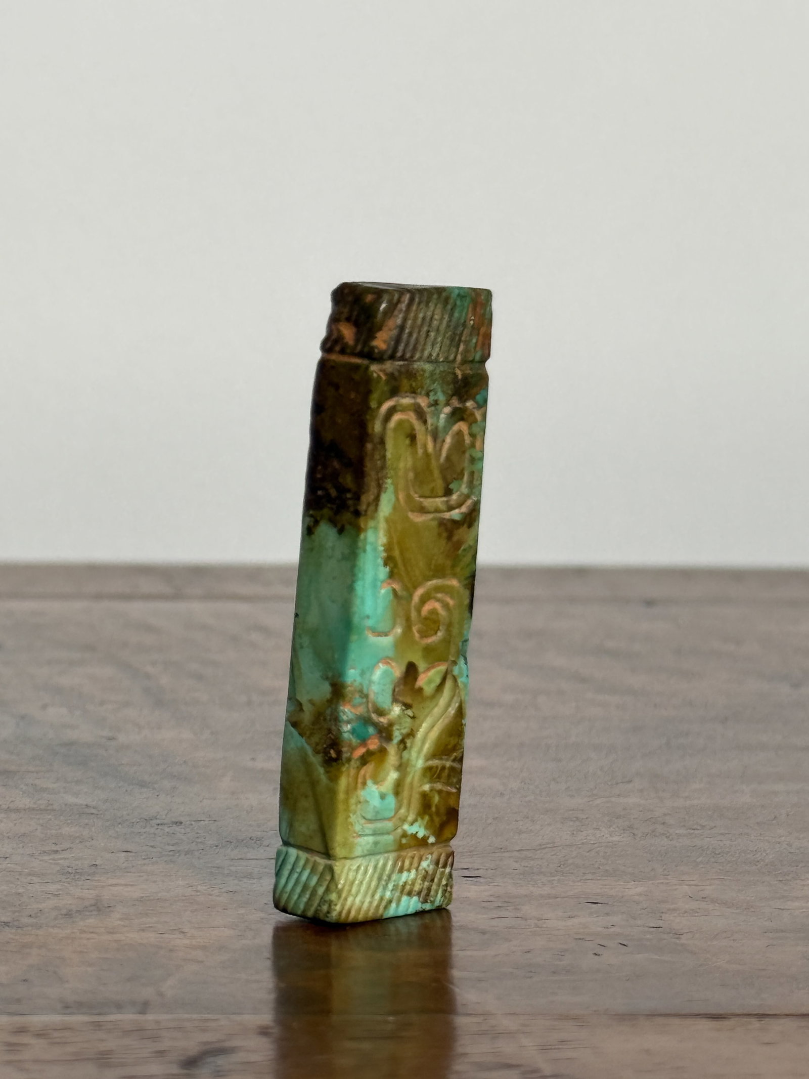 CHINESE TURQUOISE BEAD WITH INCISED DECORATION: Chinese turquoise bead with incised decoration. Dimensions: Length: 2.5 in. (6.3 cm). Note: This item is in New York, where it can be shipped from.