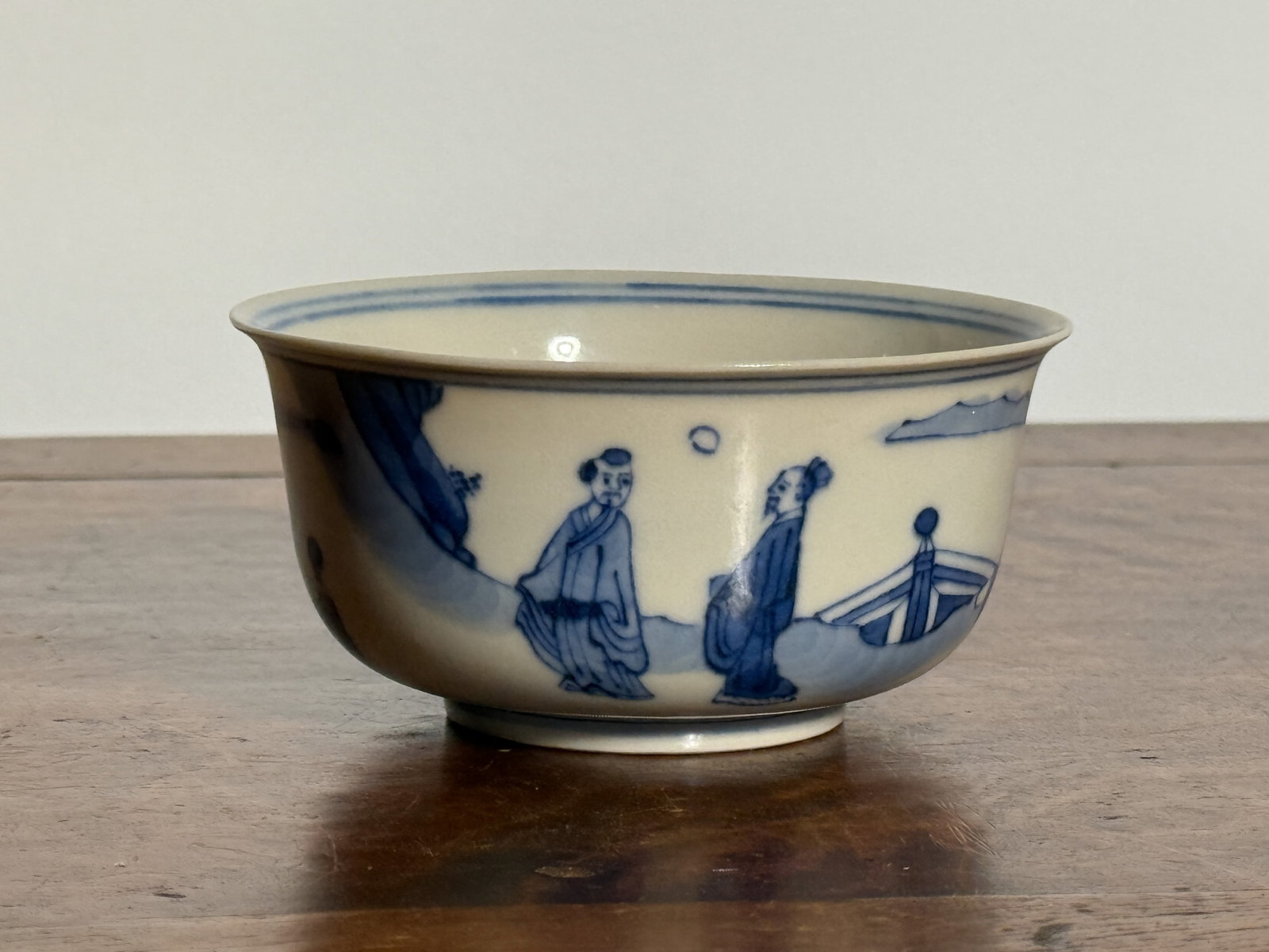 CHINESE BLUE AND WHITE PORCELAIN CUP: Chinese blue and white porcelain cup with scholar scene. Dimensions: Diameter: 4 in. (10.2 cm); Height: 1.75 in. (4.4 cm). Note: This item is in New York, where it can be shipped from.