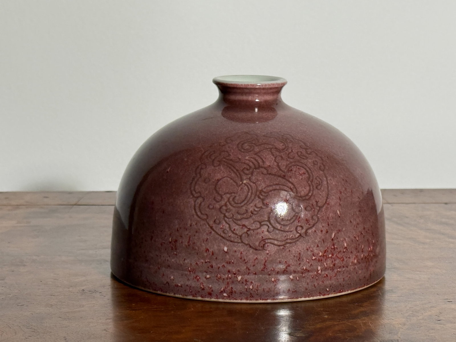CHINESE BEEHIVE-FORM PORCELAIN WATER POT: Chinese beehive-form porcelain scholar's water pot with incised decoration. Dimensions: Height: 3.5 in. (8.9 cm); Diameter: 5 in. (12.7 cm). Note: This item is in New York, where it can be shipped