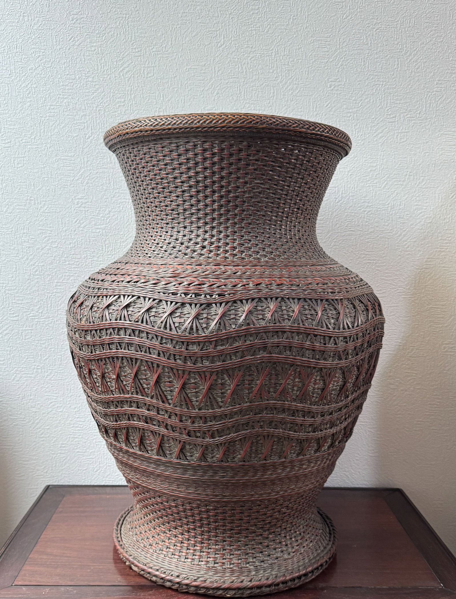 MASSIVE JAPANESE MEIJI BAMBOO-WOVEN IKEBANA VASE: Antique Japanese Meiji-period bamboo-woven ikebana vase of large size. Dimensions: Height: 24 in. (61.0 cm); Width: 18 in. (45.7 cm). Note: This item is in New York, where it can be shipped from.