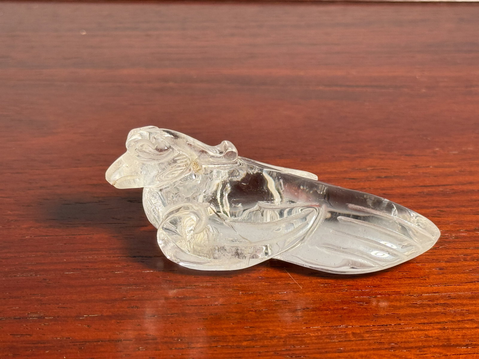 CHINESE ROCK CRYSTAL BIRD: Chinese carved rock crystal bird. Dimensions: Length: 3 in. (7.6 cm). Note: This item is in New York, where it can be shipped from.