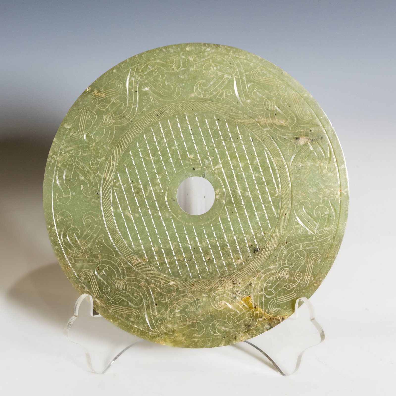 A LARGE CHINESE JADE BI DISC (1 of 6)