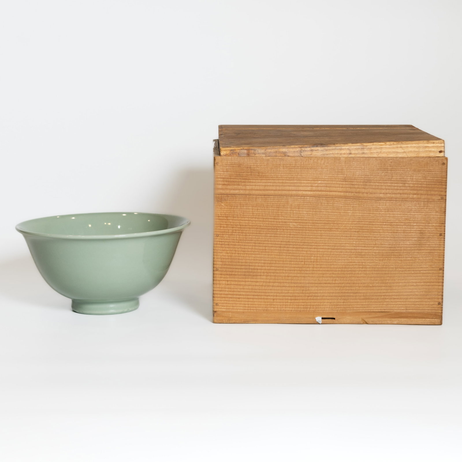 A LARGE CELADON-GLAZED PORCELAIN BOWL (1 of 5)