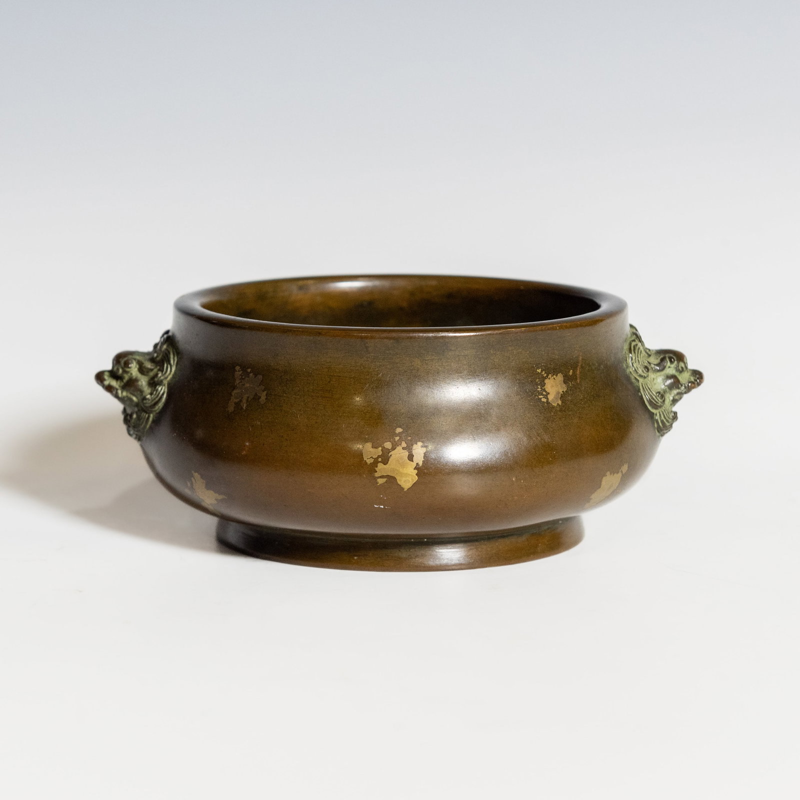 A CHINESE GILT-DECORATED BRONZE CENSER (1 of 8)