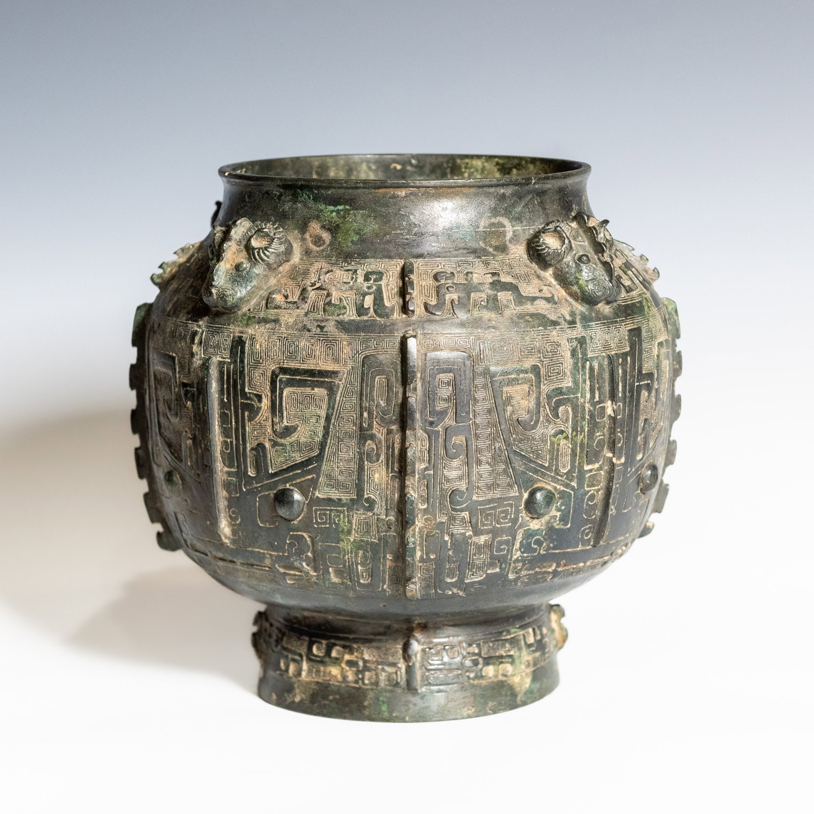 A CHINESE BRONZE RITUAL VASE: A Chinese bronze ritual vase. 19 x 19 cm