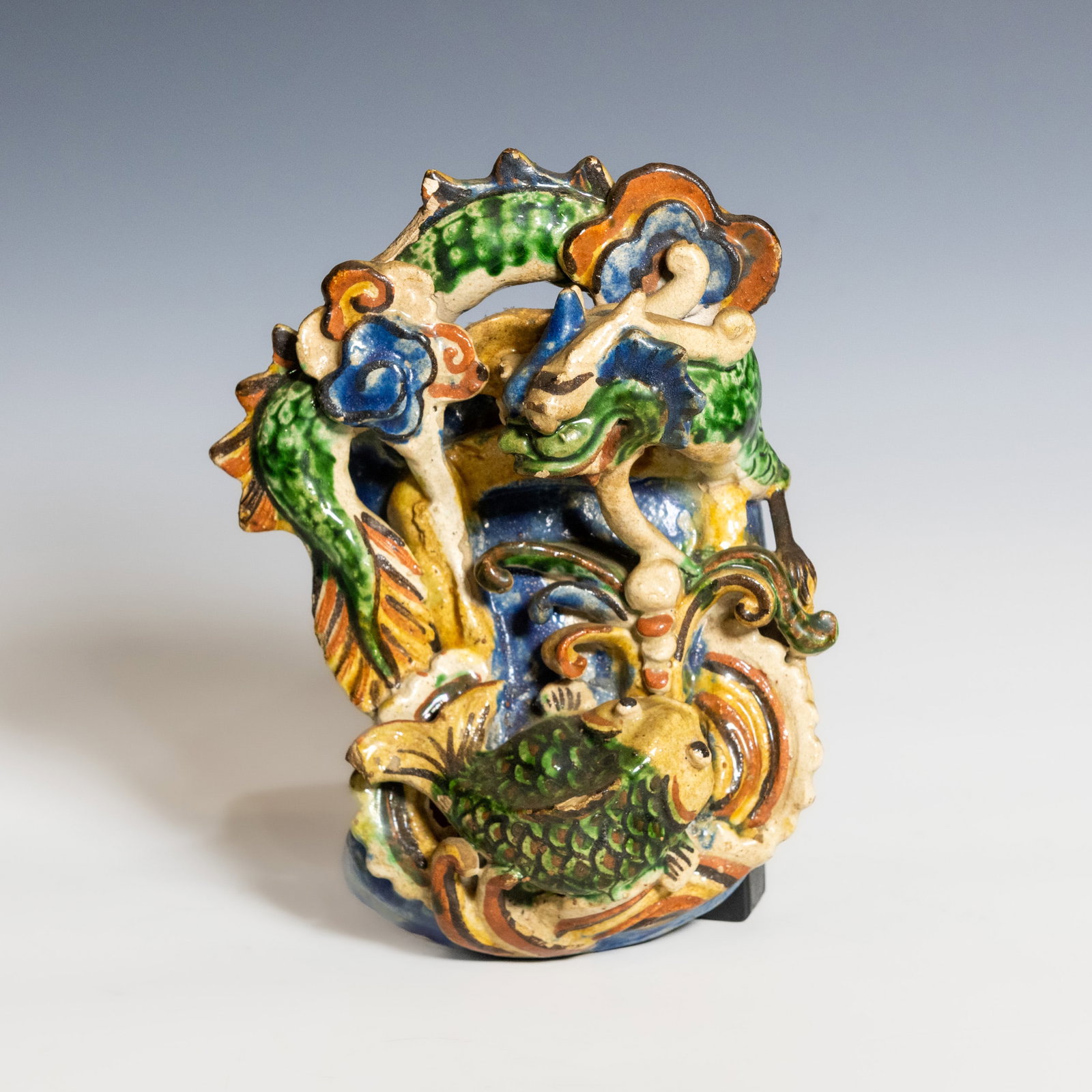 A SHIWAN POLYCHROME-GLAZED POTTERY WALL POCKET WITH TWO SCHOLARS AND CARP (1 of 10)